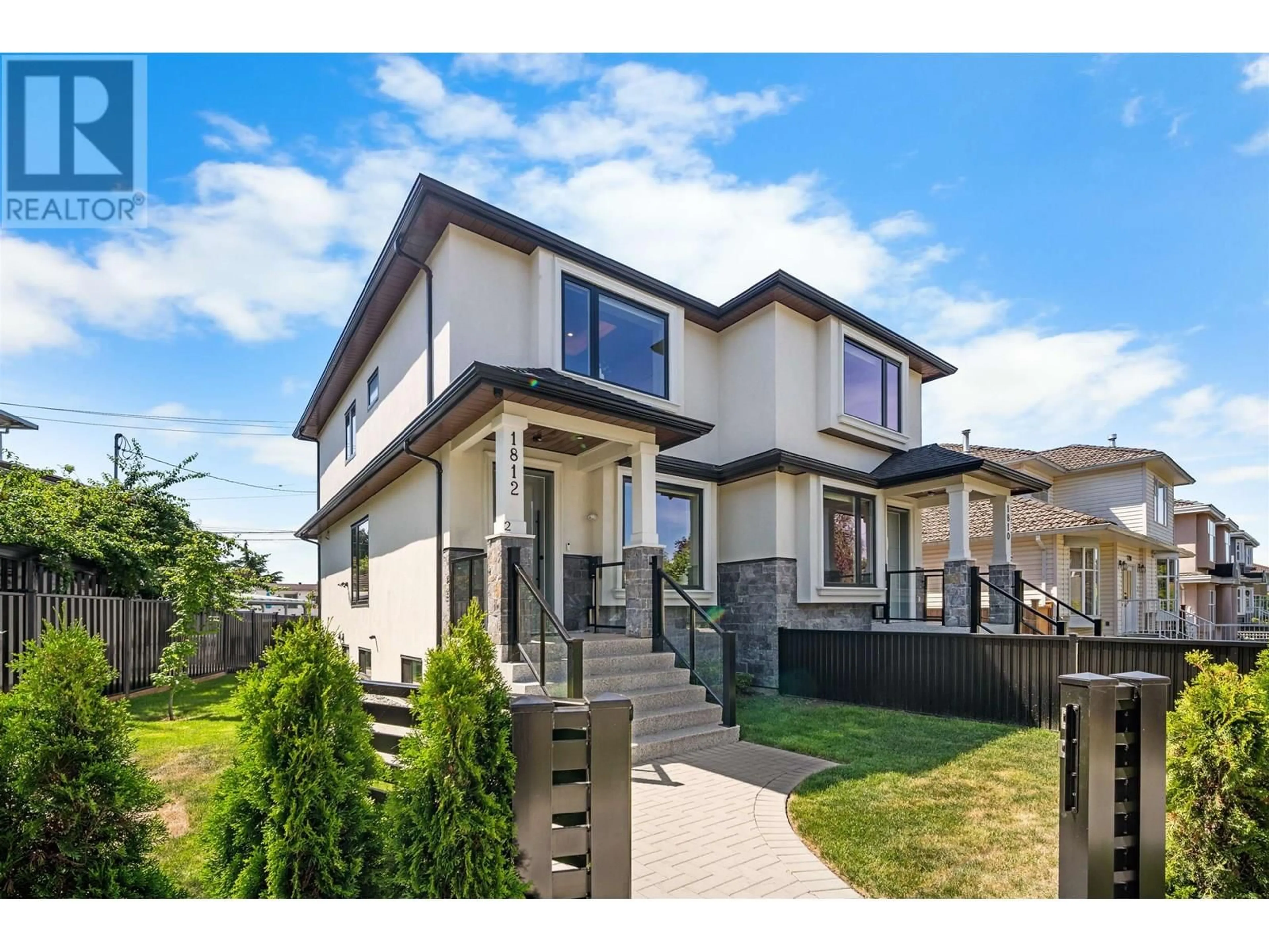 Home with vinyl exterior material, street for 1812 55TH AVENUE, Vancouver British Columbia V5P2A1