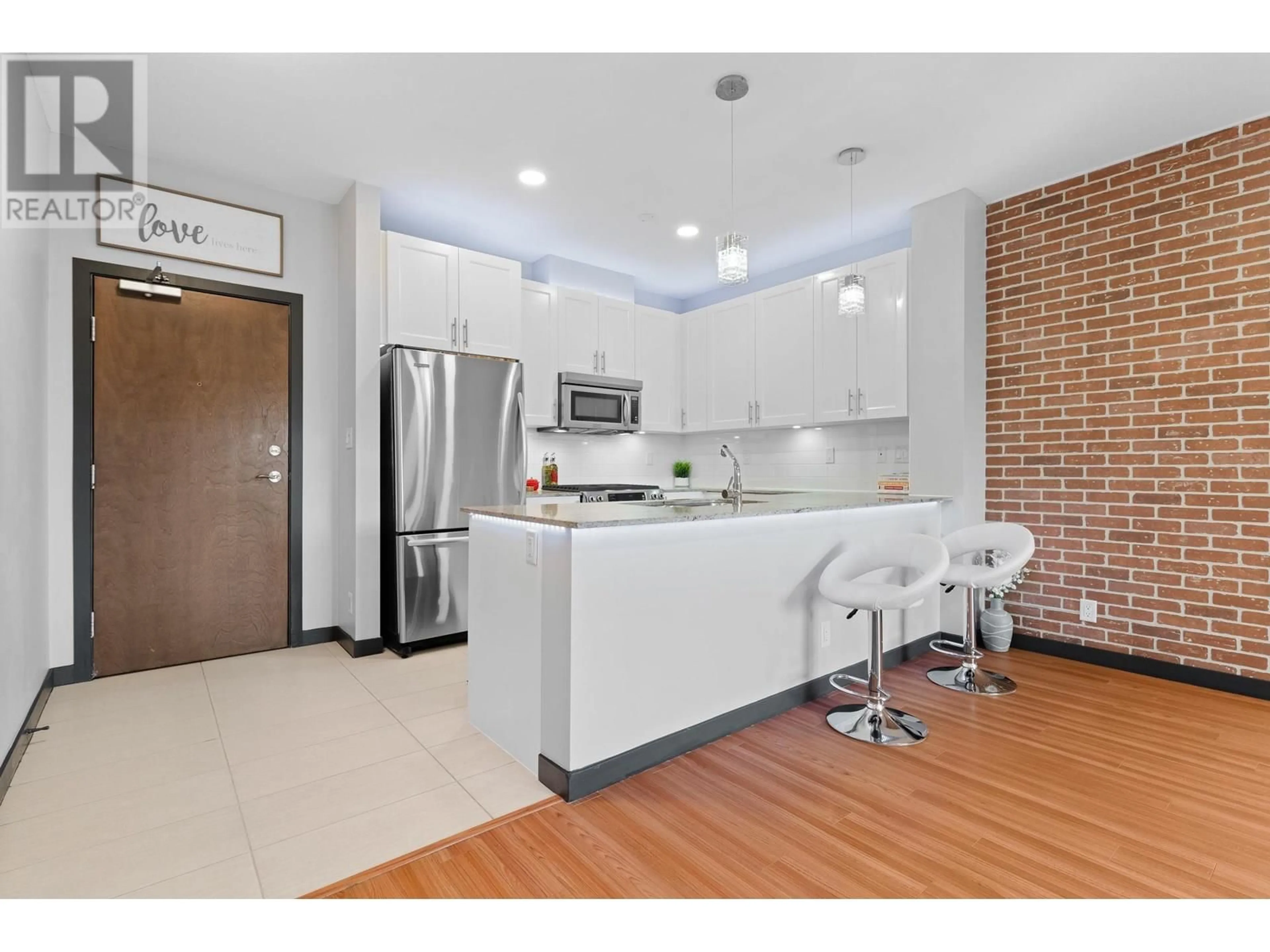 Open concept kitchen, ceramic/tile floor for 416 - 101 MORRISSEY ROAD, Port Moody British Columbia V3H0E6