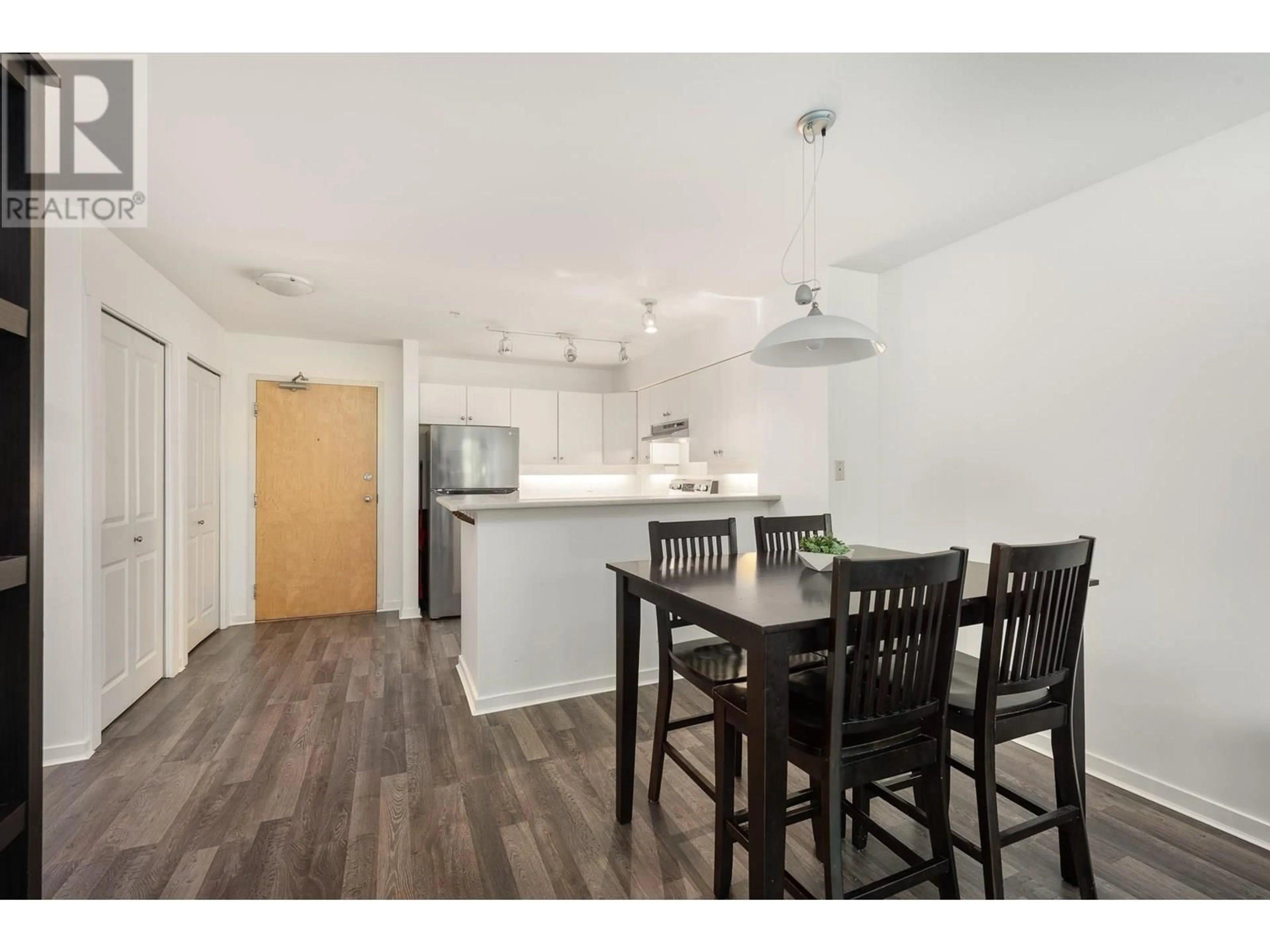 Open concept kitchen, wood/laminate floor for 309 - 18 SMOKEY SMITH PLACE, New Westminster British Columbia V3L5V3