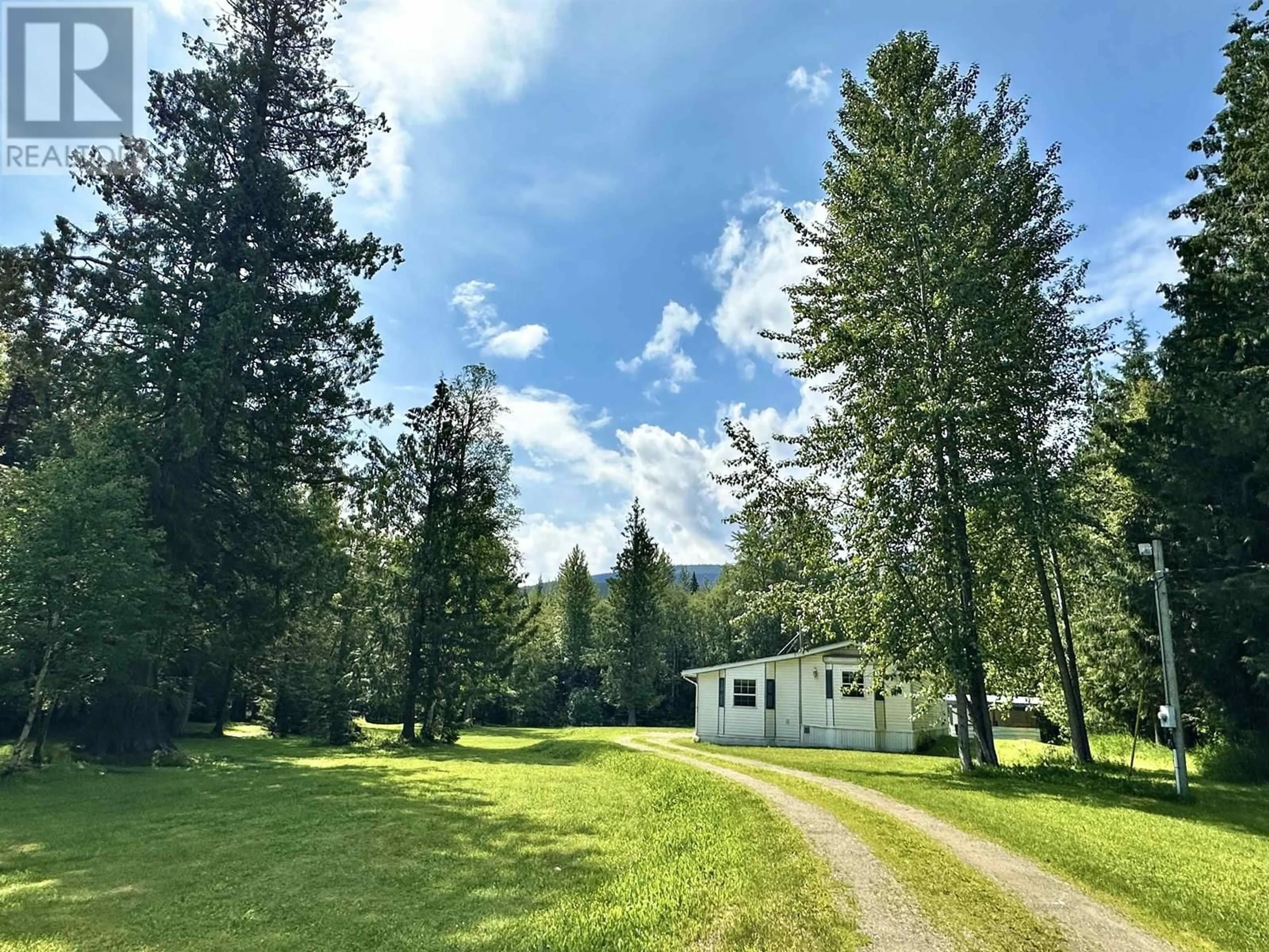 A pic from outside/outdoor area/front of a property/back of a property/a pic from drone, forest/trees view for 3483 LITTLE BELL ROAD, McBride British Columbia V0J2E0