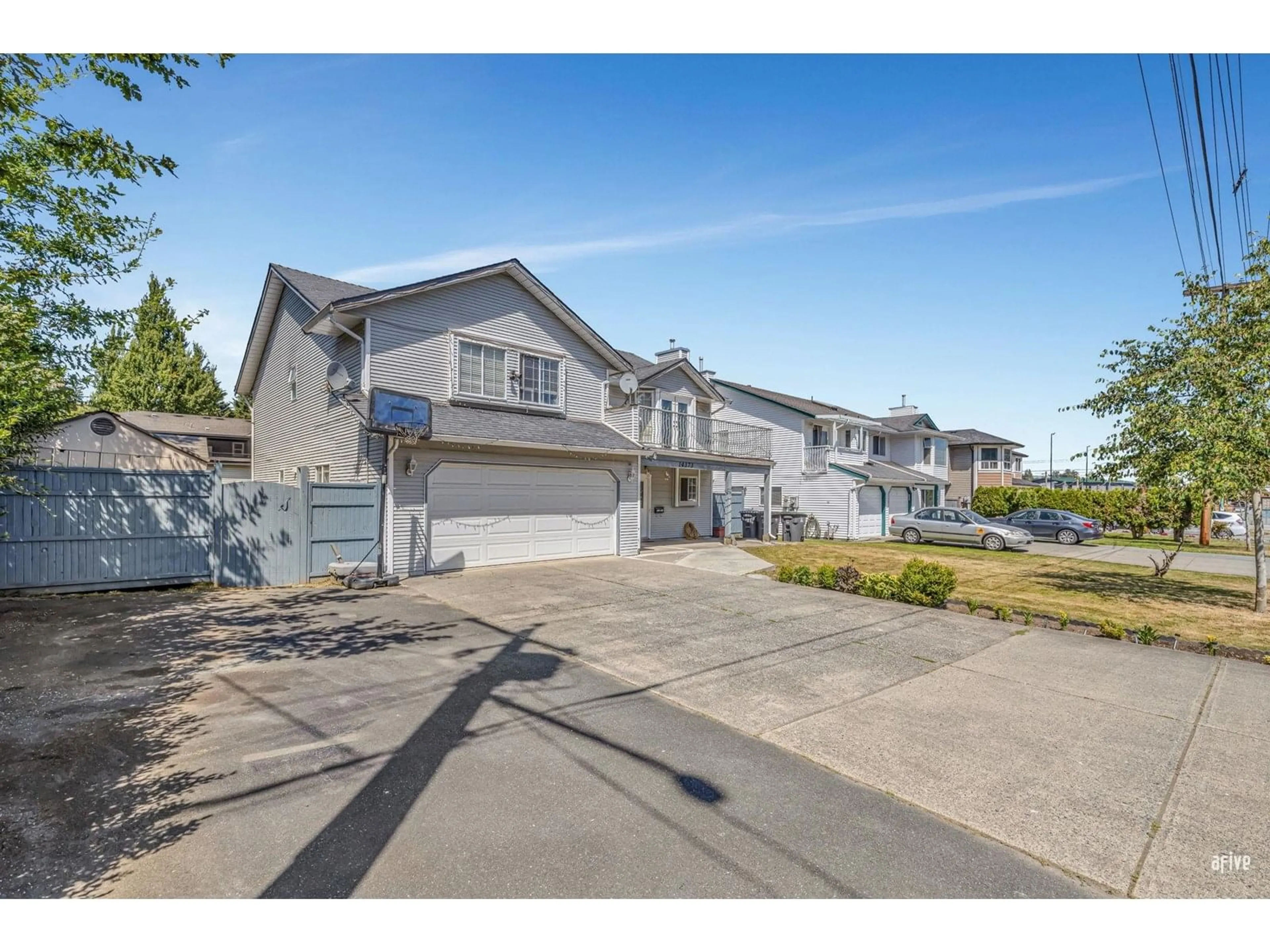 A pic from outside/outdoor area/front of a property/back of a property/a pic from drone, street for 14373 66, Surrey British Columbia V3W2B4