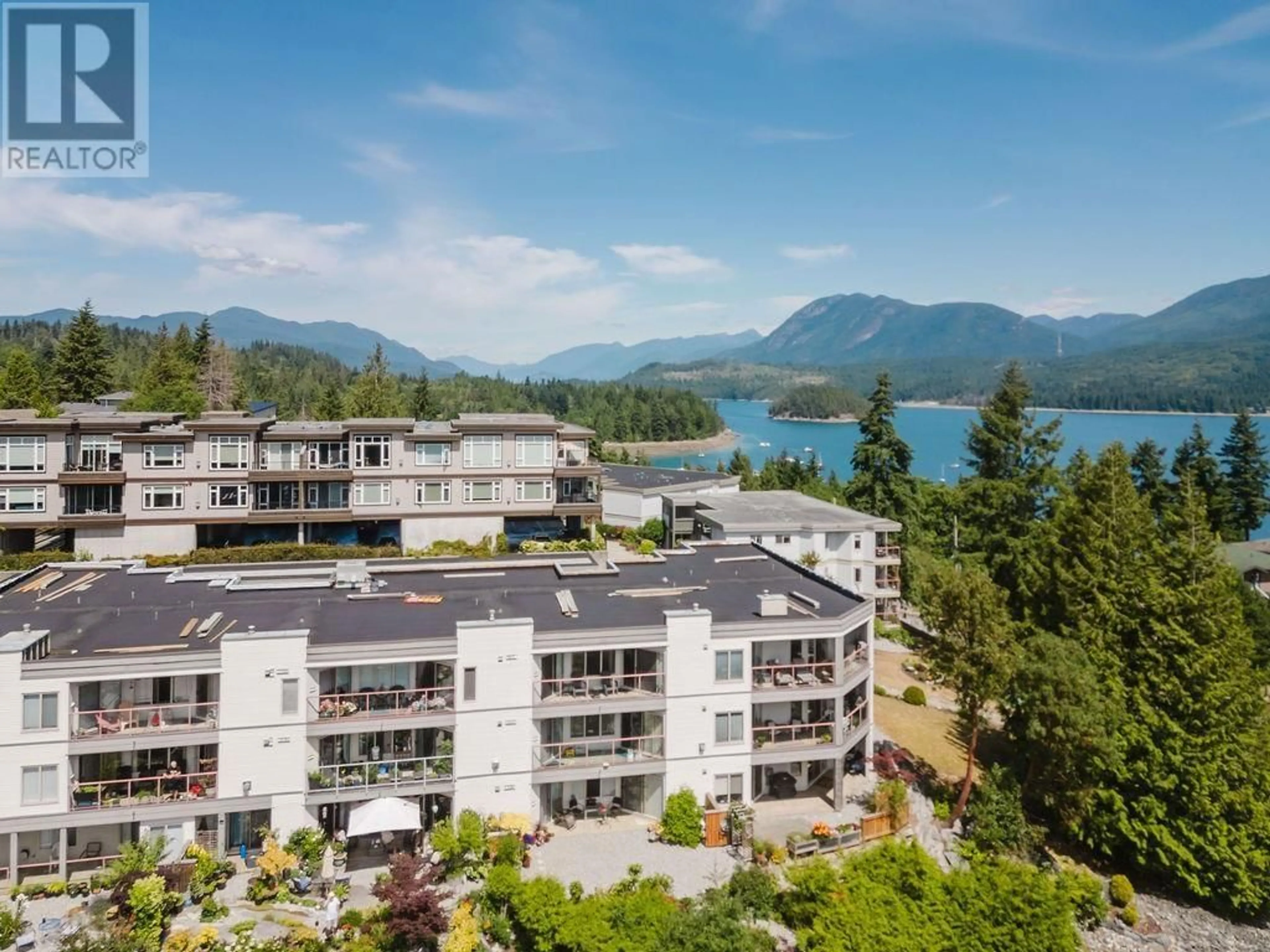 A pic from outside/outdoor area/front of a property/back of a property/a pic from drone, water/lake/river/ocean view for 302 - 5780 TRAIL AVENUE, Sechelt British Columbia V0N3A6