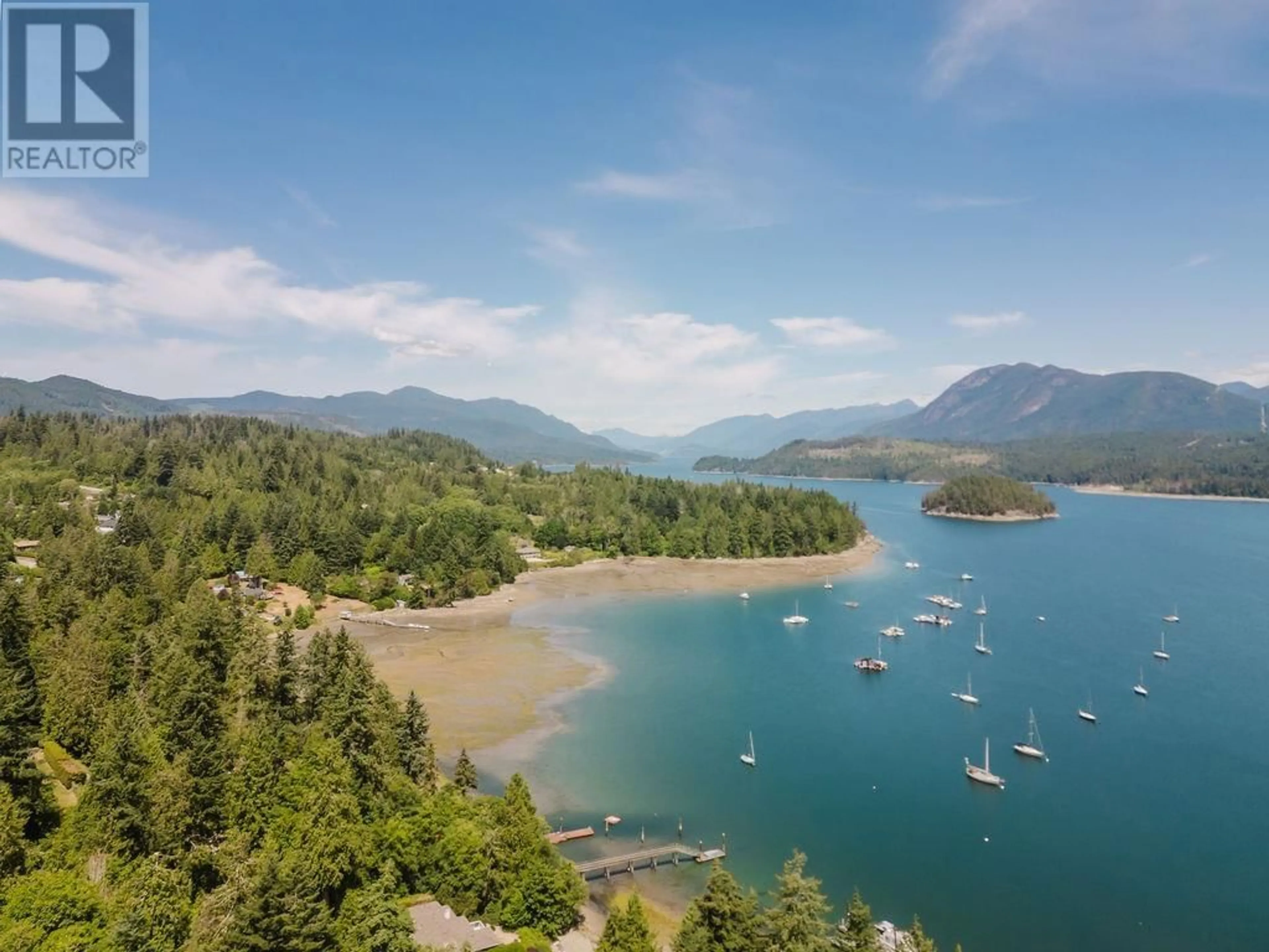 A pic from outside/outdoor area/front of a property/back of a property/a pic from drone, water/lake/river/ocean view for 302 - 5780 TRAIL AVENUE, Sechelt British Columbia V0N3A6