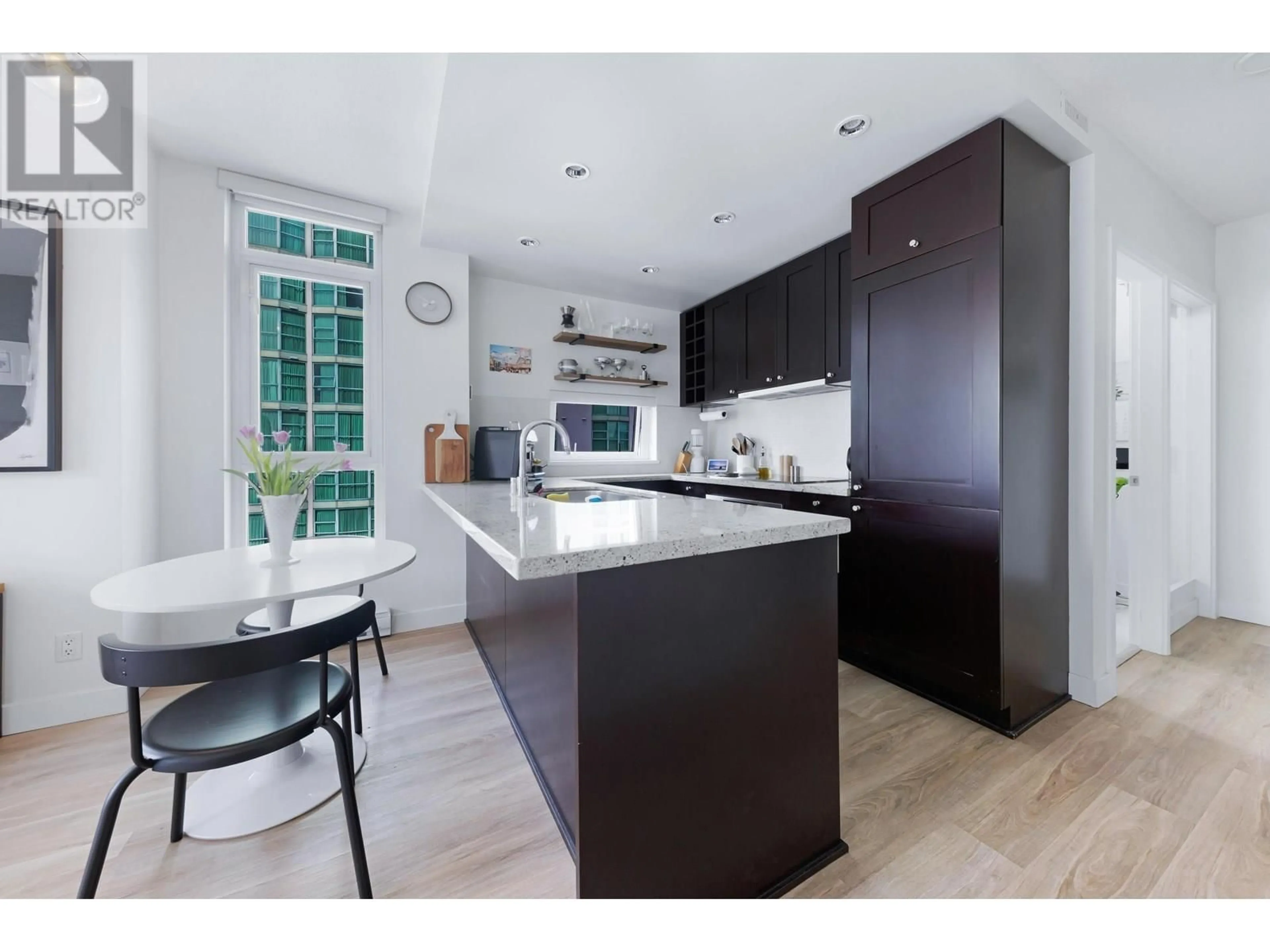 Contemporary kitchen, wood/laminate floor for 1408 - 821 CAMBIE STREET, Vancouver British Columbia V6B0E3