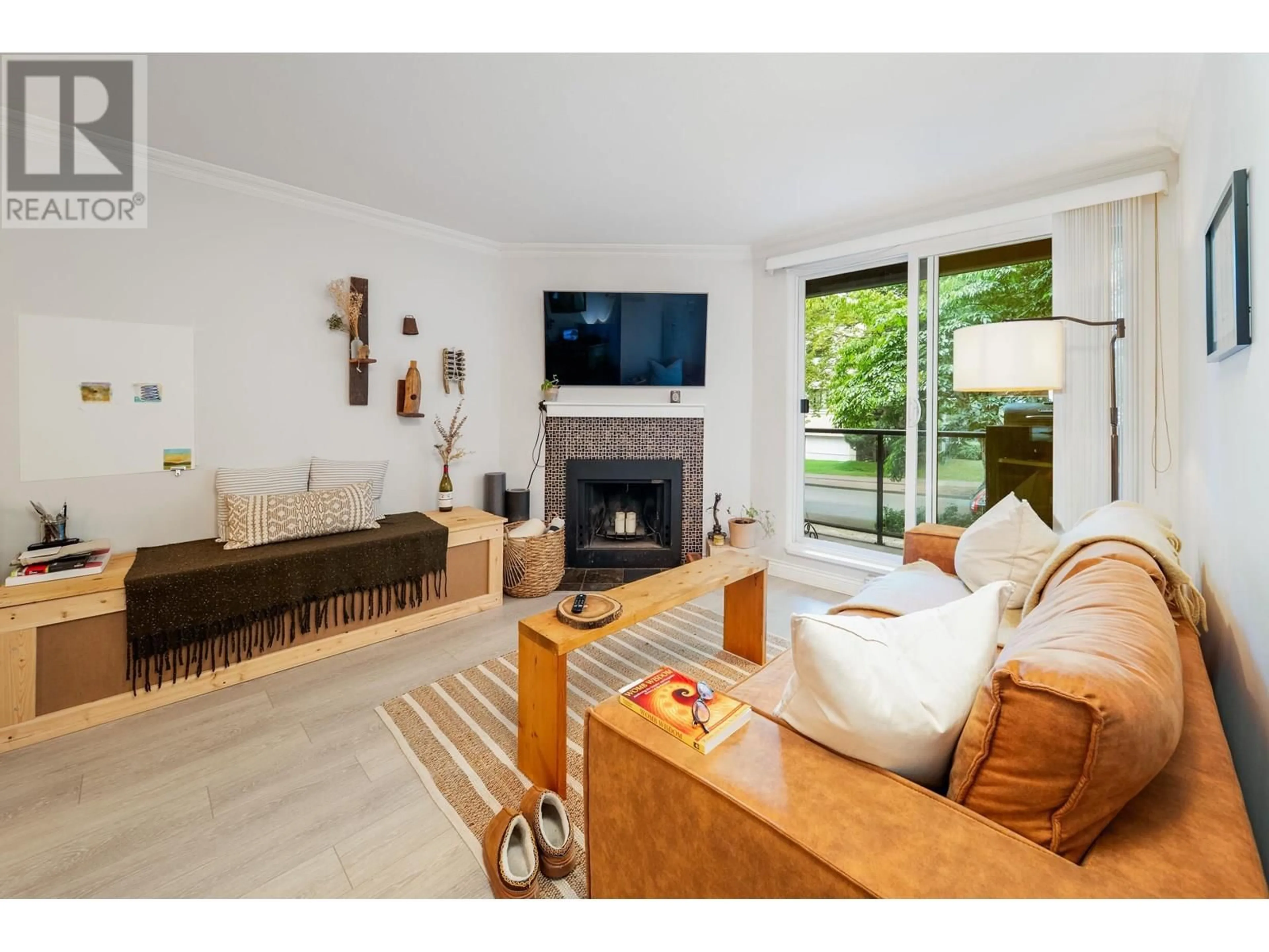 Living room with furniture, wood/laminate floor for 209 - 1550 BARCLAY STREET, Vancouver British Columbia V6G3B1