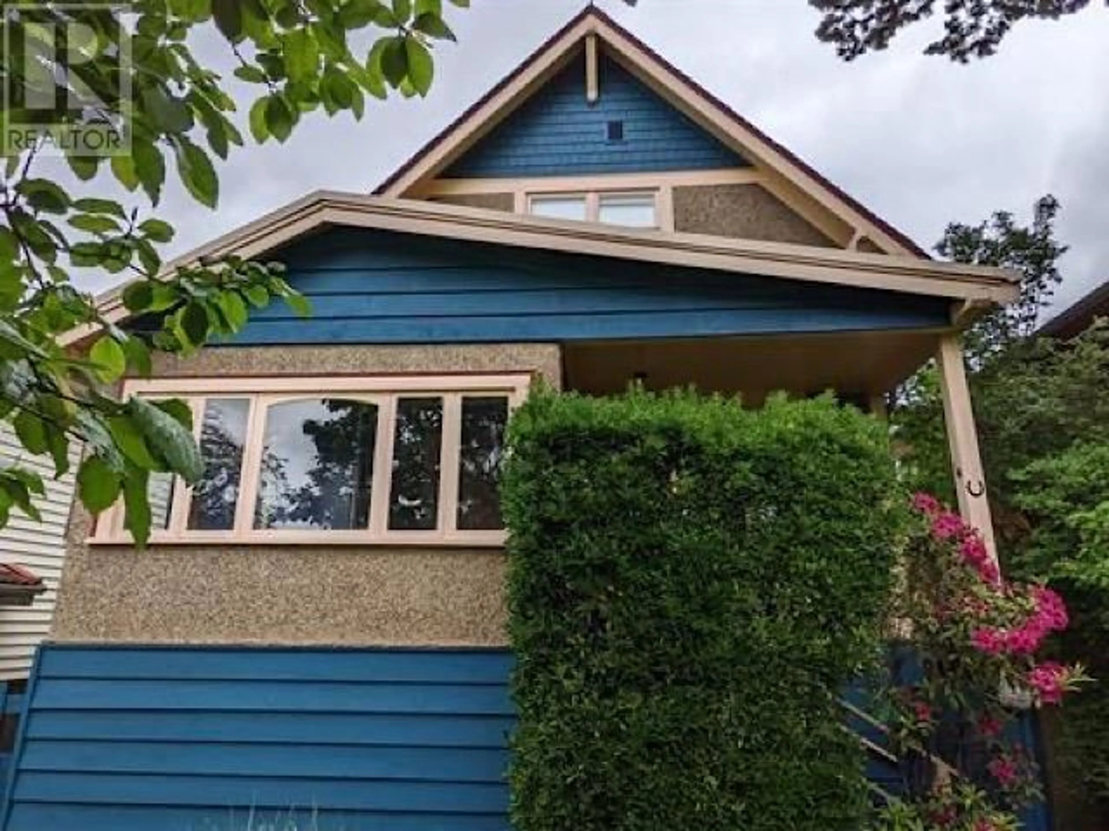 Home with vinyl exterior material, street for 1159 19 AVENUE, Vancouver British Columbia V5V1K9