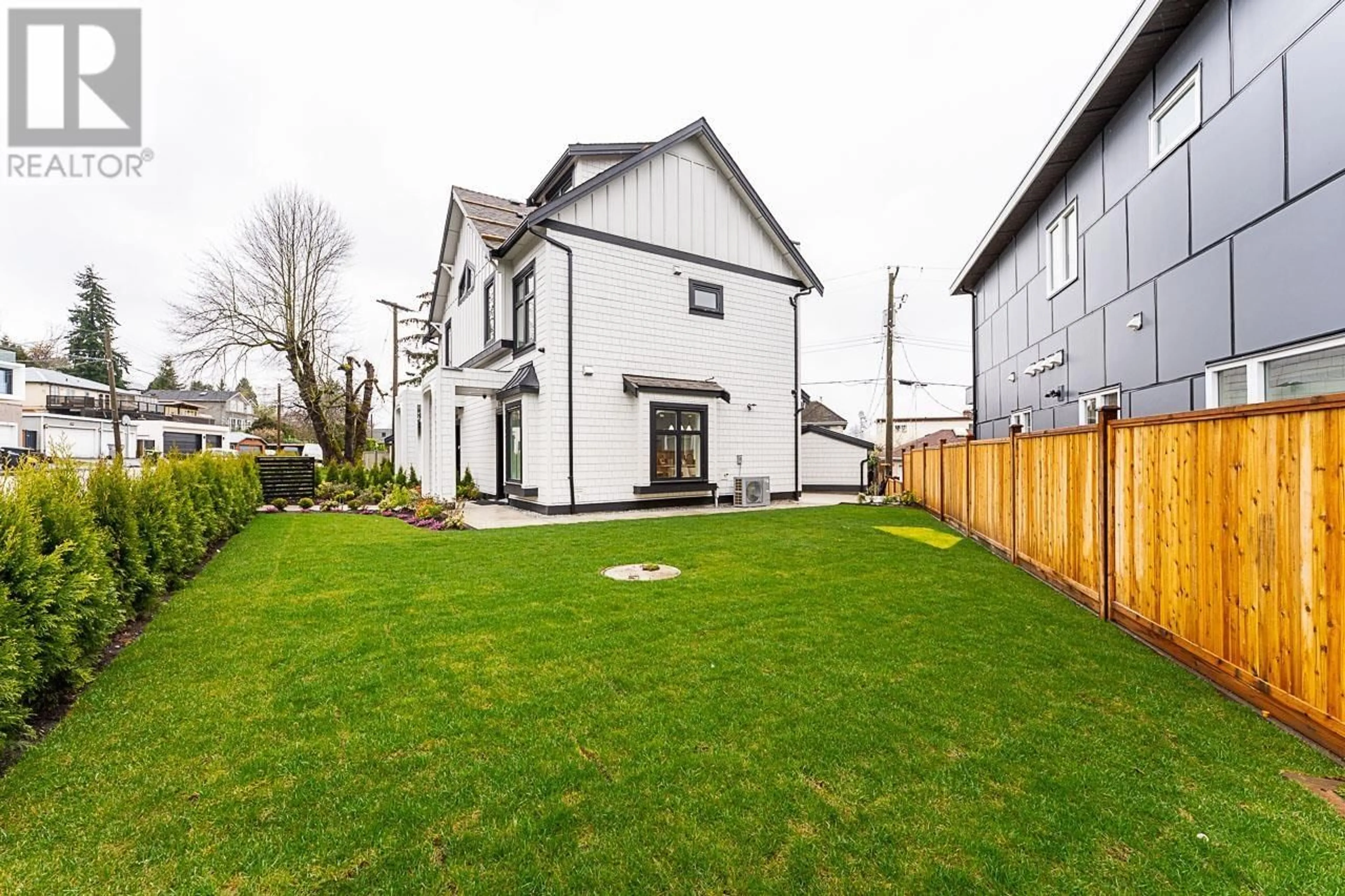 A pic from outside/outdoor area/front of a property/back of a property/a pic from drone, street for 1 - 2837 OLIVER CRESCENT, Vancouver British Columbia V6L1T1