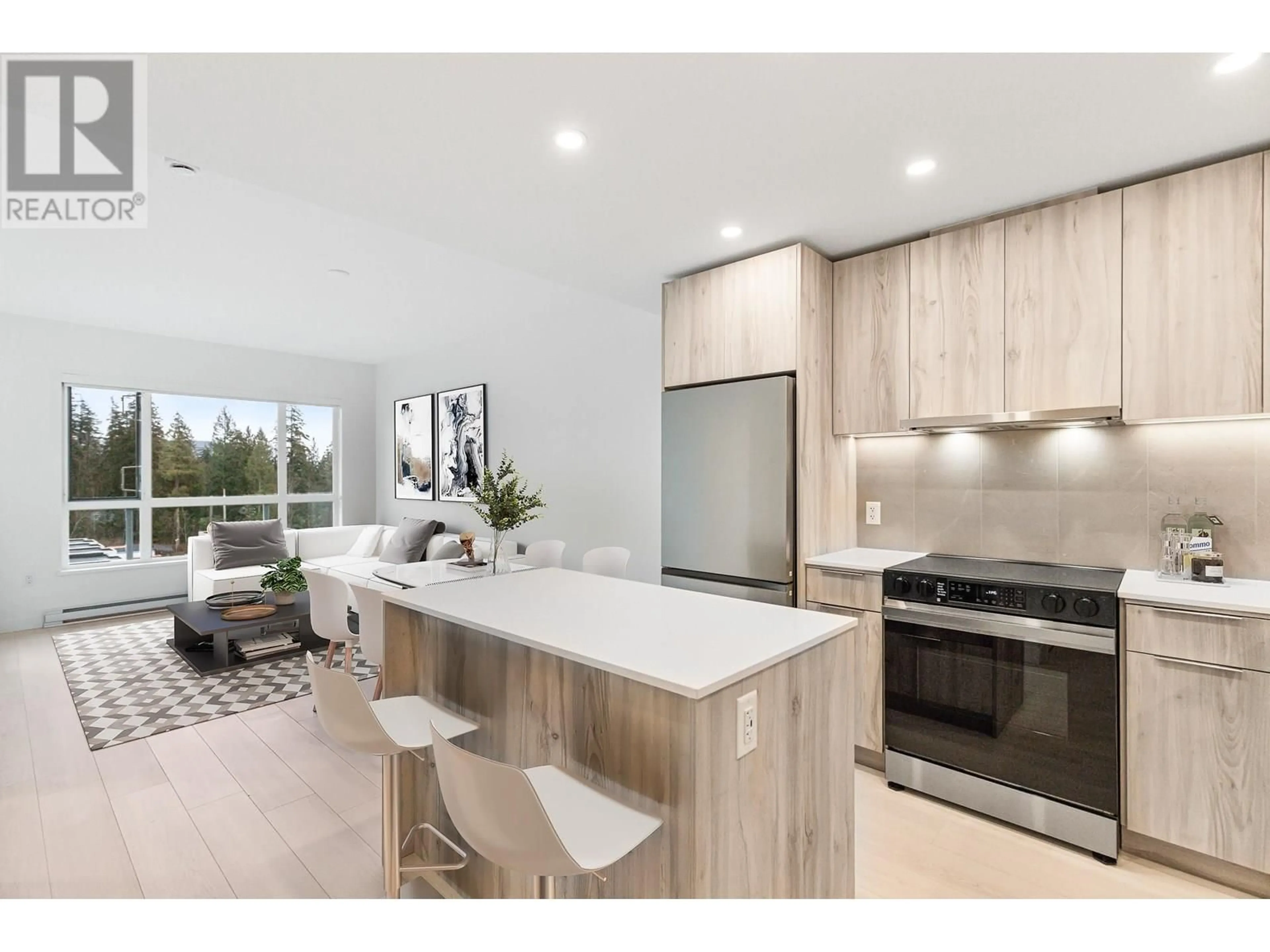 Open concept kitchen, wood/laminate floor for 616 - 3596 MALSUM DRIVE, North Vancouver British Columbia V7G0B5