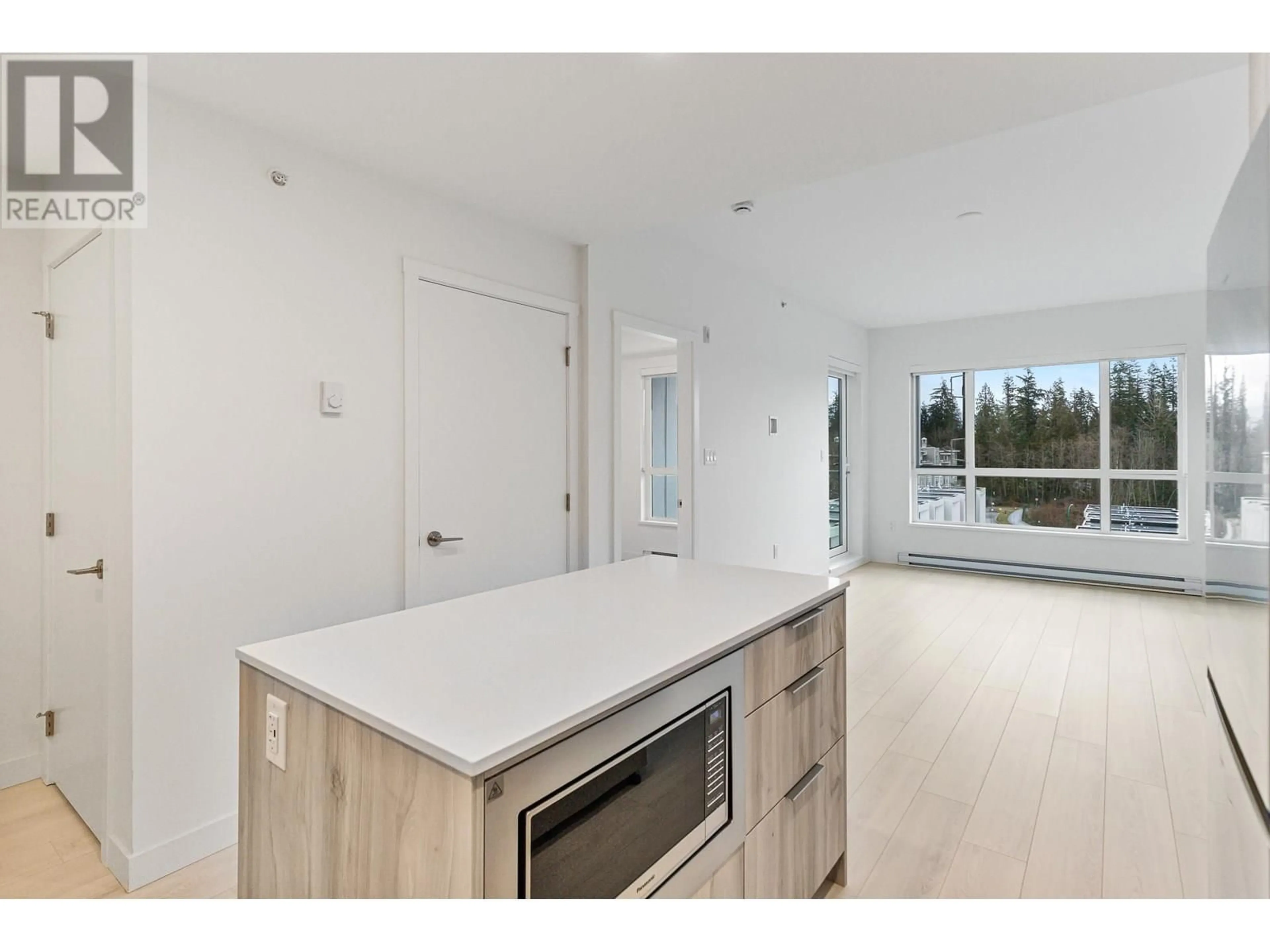 Open concept kitchen, unknown for 616 - 3596 MALSUM DRIVE, North Vancouver British Columbia V7G0B5