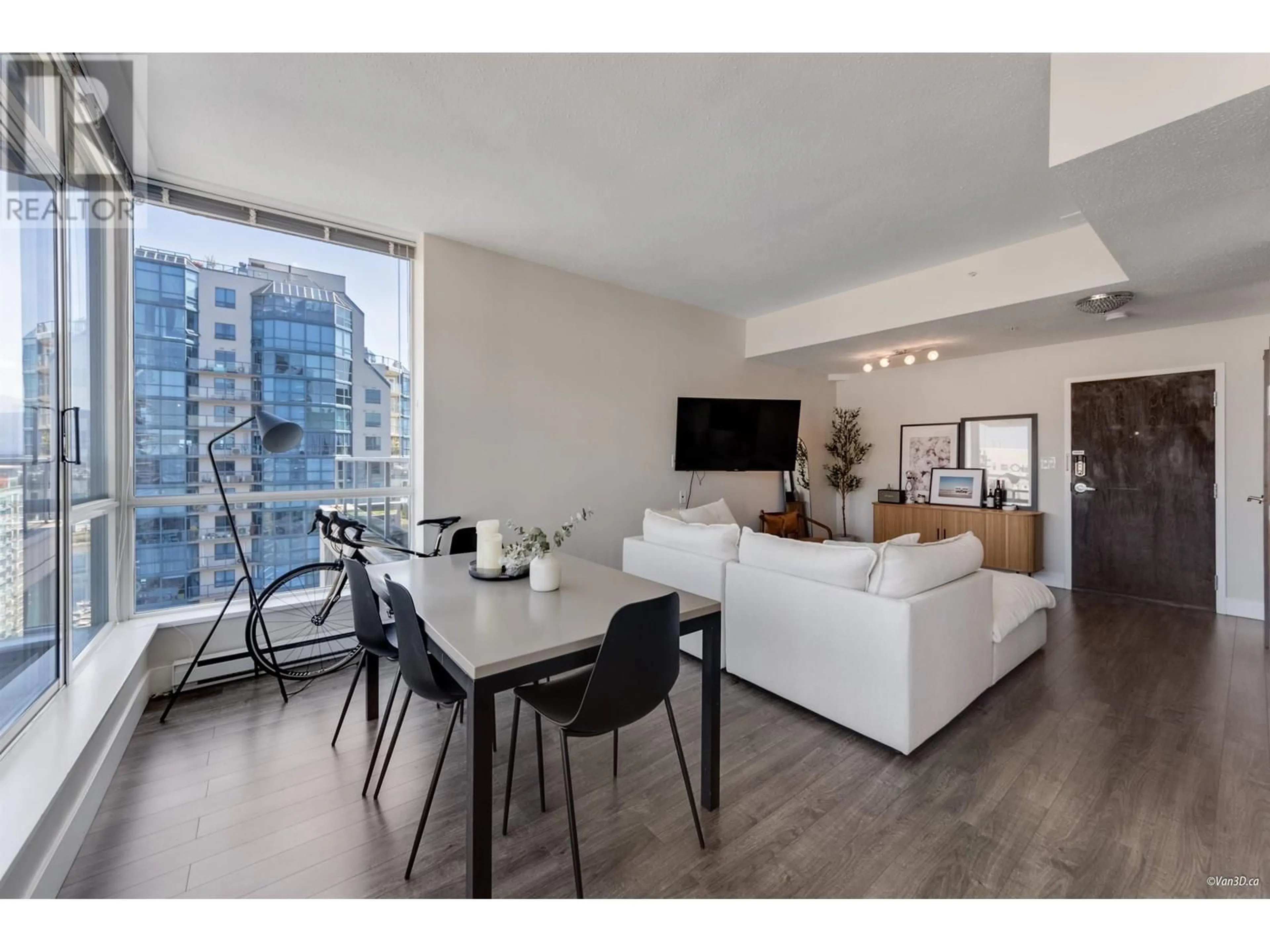 Living room with furniture, wood/laminate floor for 2204 - 1420 GEORGIA STREET, Vancouver British Columbia V6G3K4
