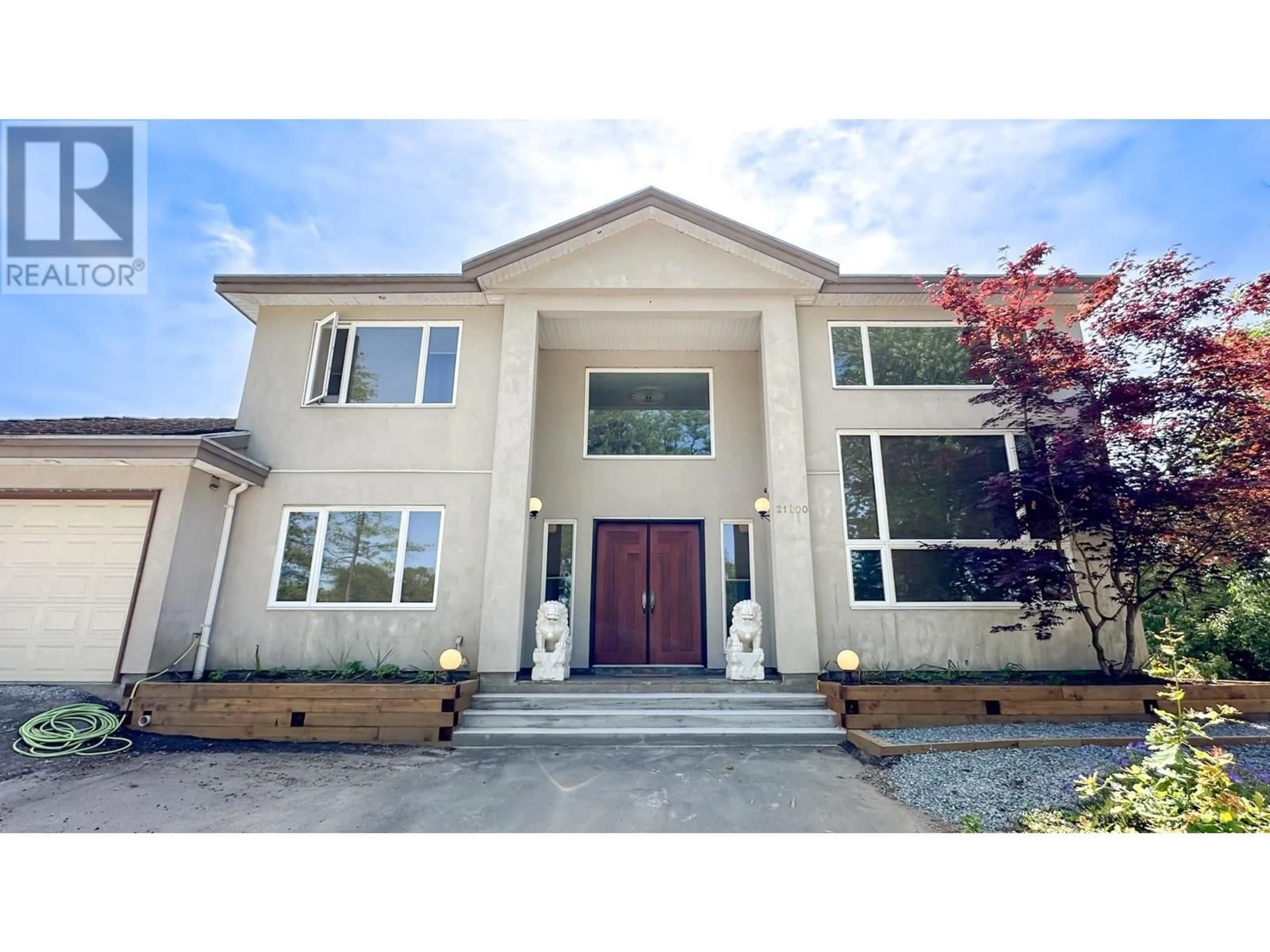 Home with vinyl exterior material, street for 21800 RIVER ROAD, Richmond British Columbia V6V1M4
