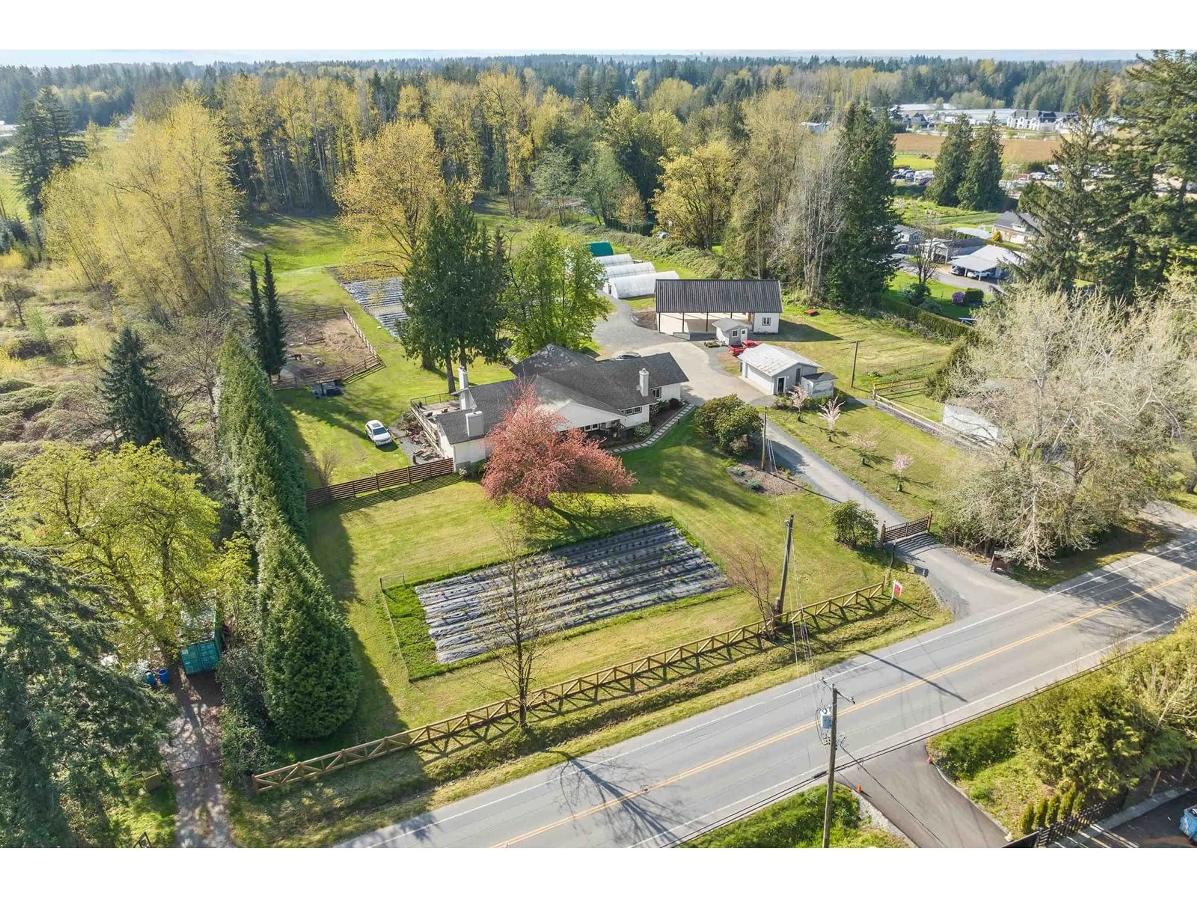 A pic from outside/outdoor area/front of a property/back of a property/a pic from drone, street for 5441 256, Langley British Columbia V4W1E7