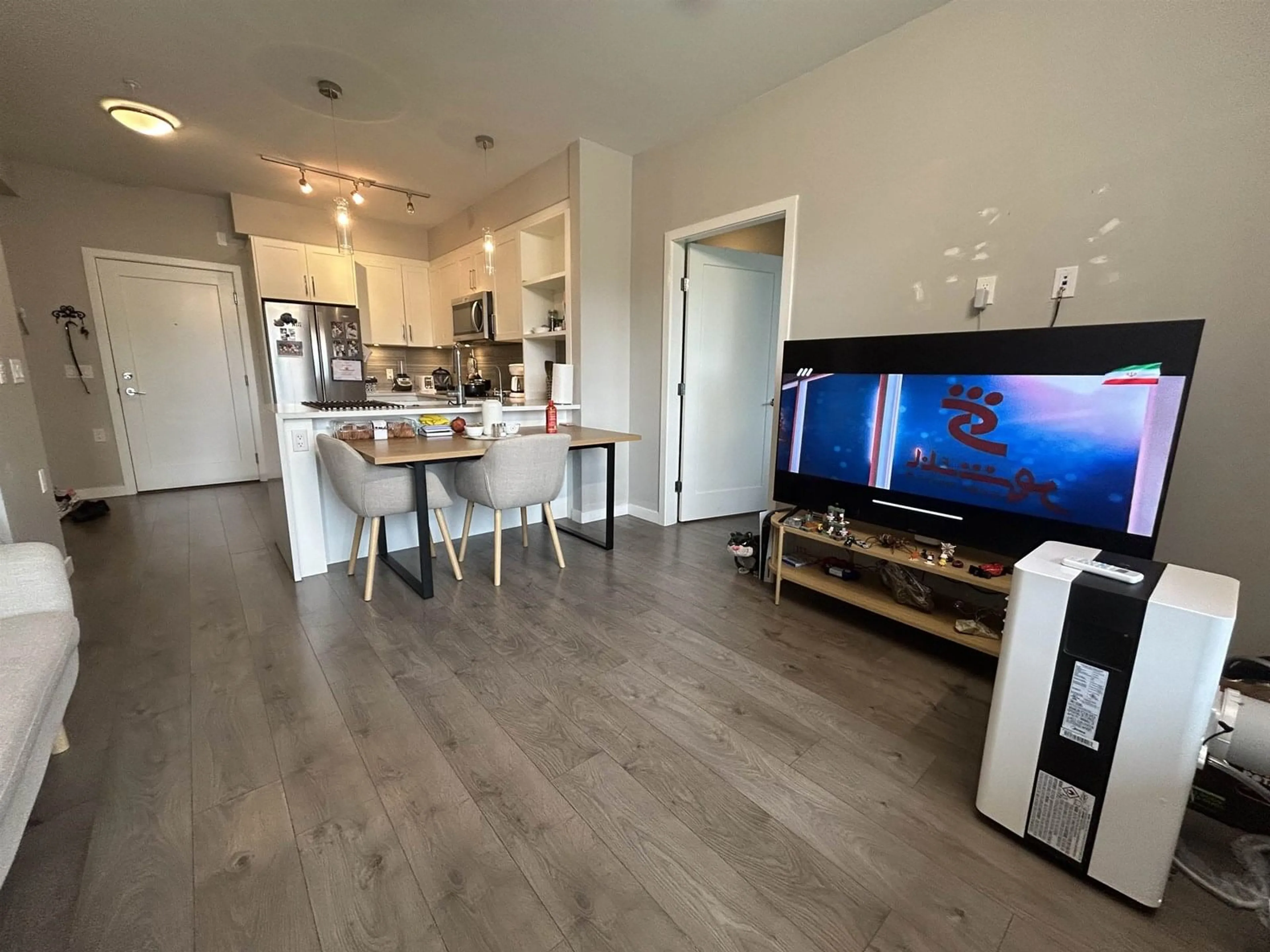 Open concept kitchen, wood/laminate floor for F308 - 20211 66, Langley British Columbia V2Y0L4