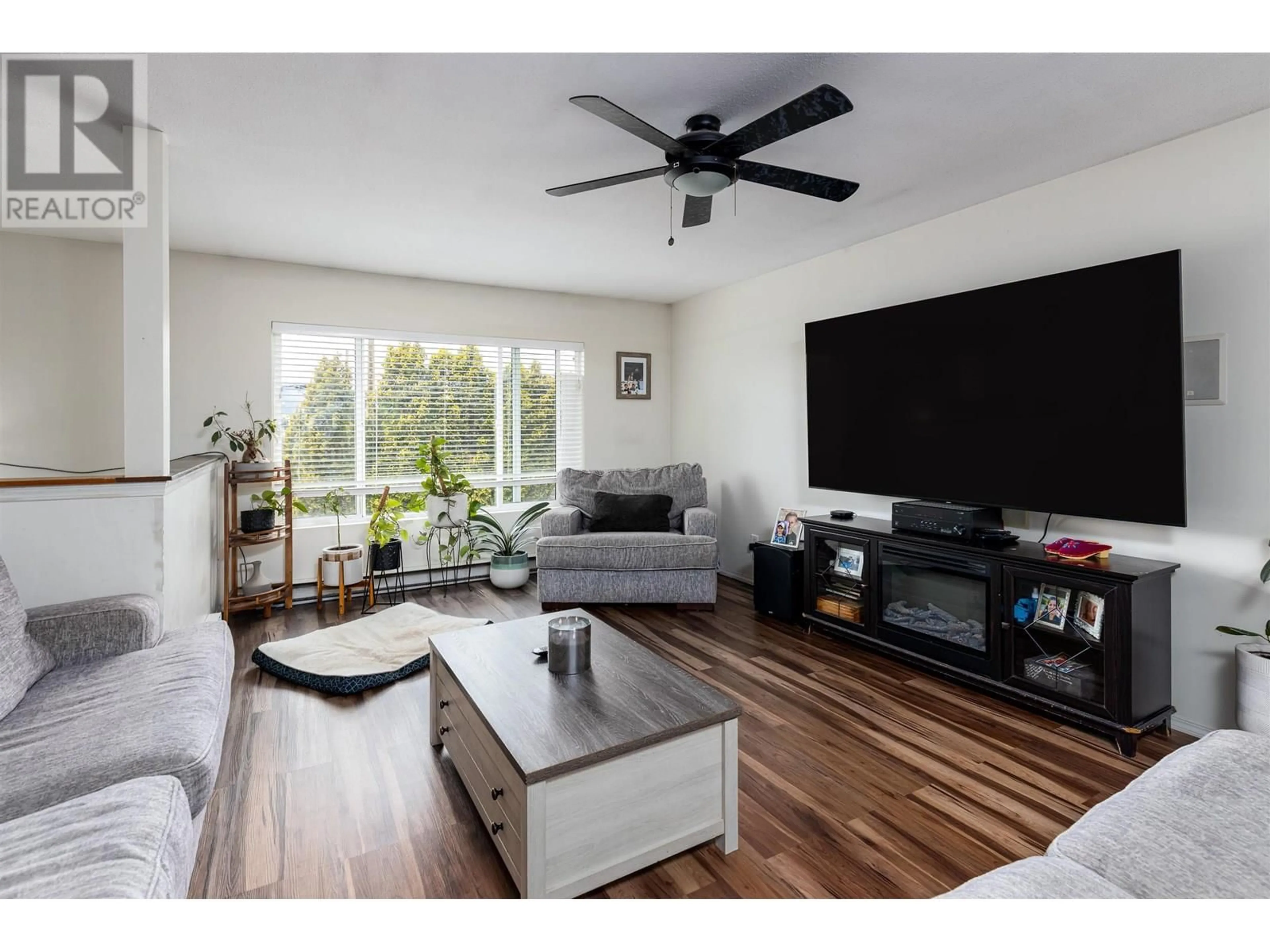 Living room with furniture, wood/laminate floor for 3512 HANSON STREET, Terrace British Columbia V8G2L7
