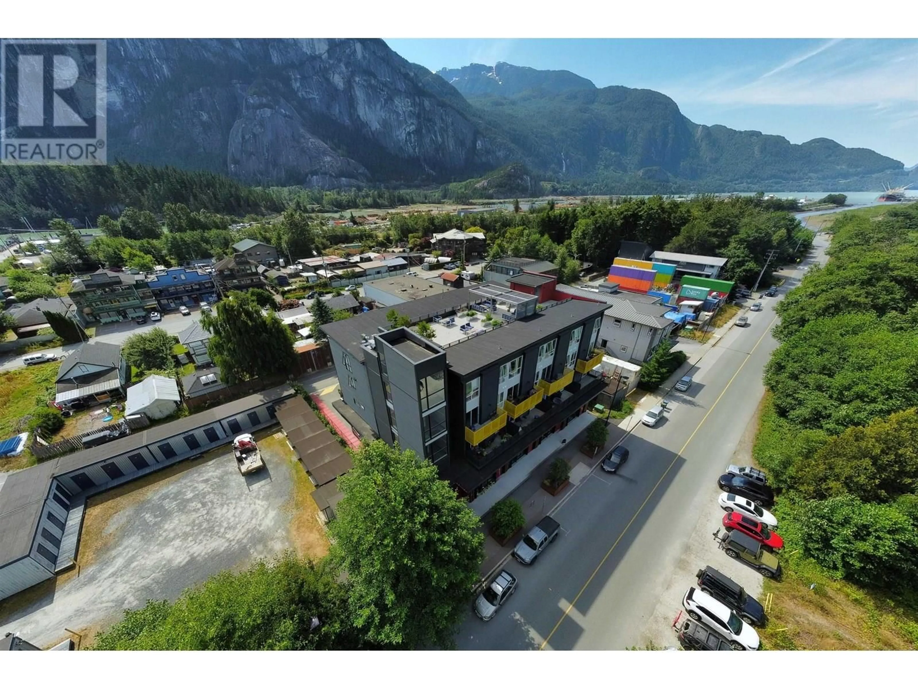 A pic from outside/outdoor area/front of a property/back of a property/a pic from drone, mountain view for 301 - 37762 THIRD AVENUE, Squamish British Columbia V8B1C3