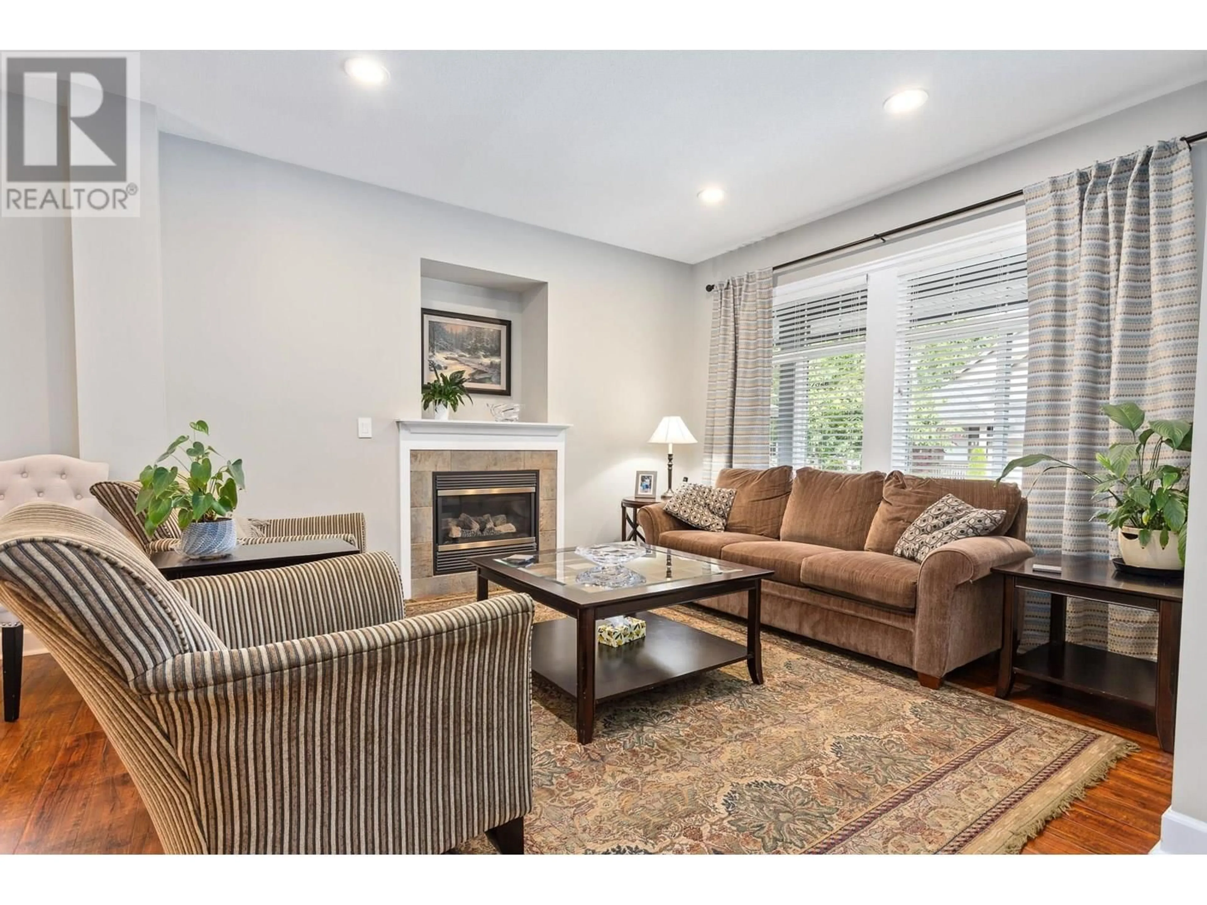 Living room with furniture, wood/laminate floor for 11259 BLANEY WAY, Pitt Meadows British Columbia V3Y2V3