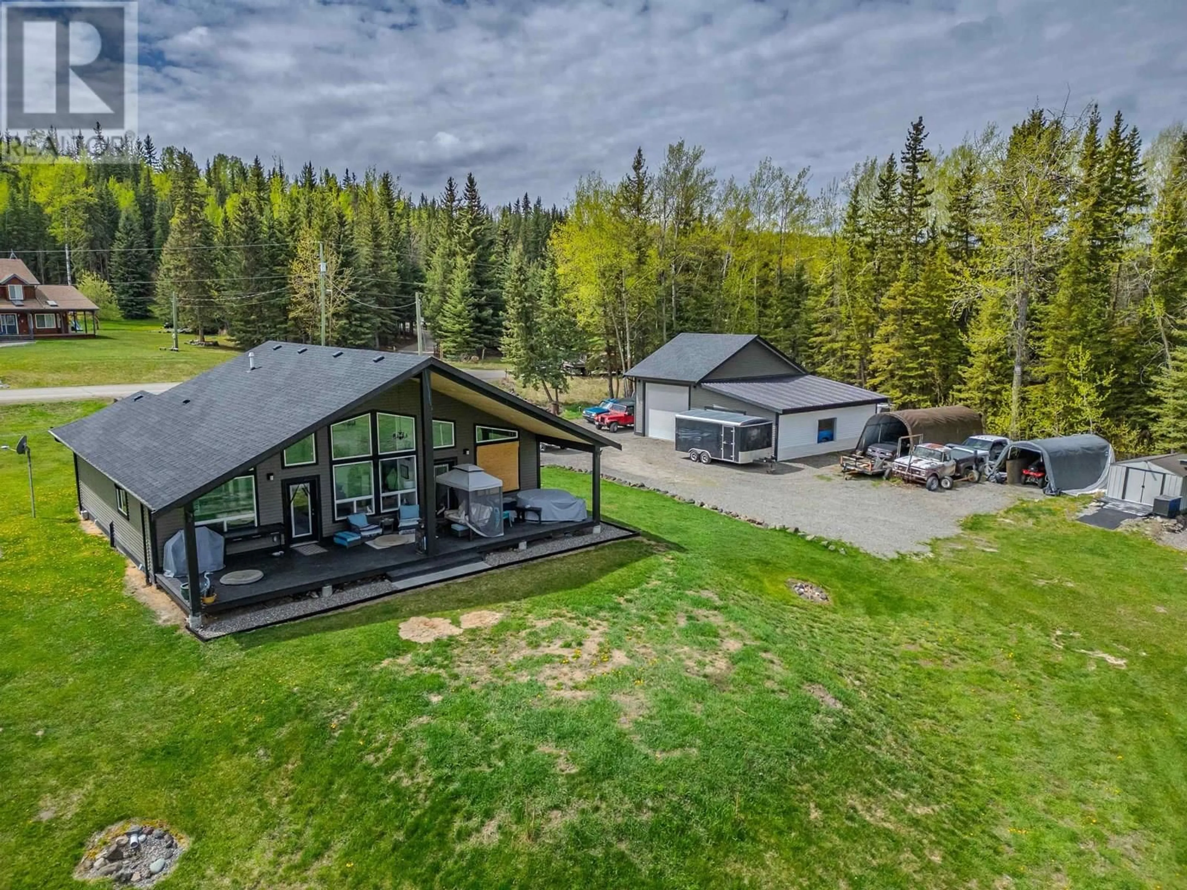 A pic from outside/outdoor area/front of a property/back of a property/a pic from drone, mountain view for 6199 HUNT ROAD, 100 Mile House British Columbia V0K2E3
