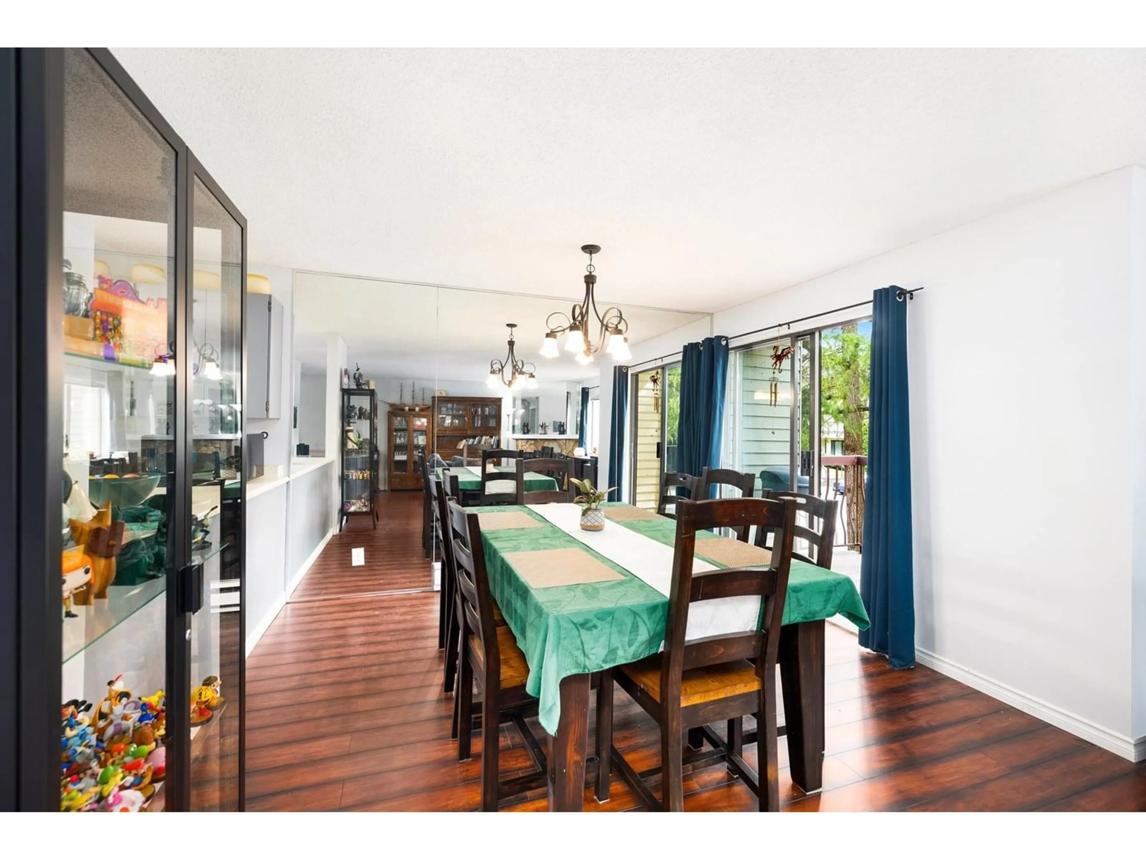 Dining room, wood/laminate floor for 201 - 7064 133B, Surrey British Columbia V3W8A4