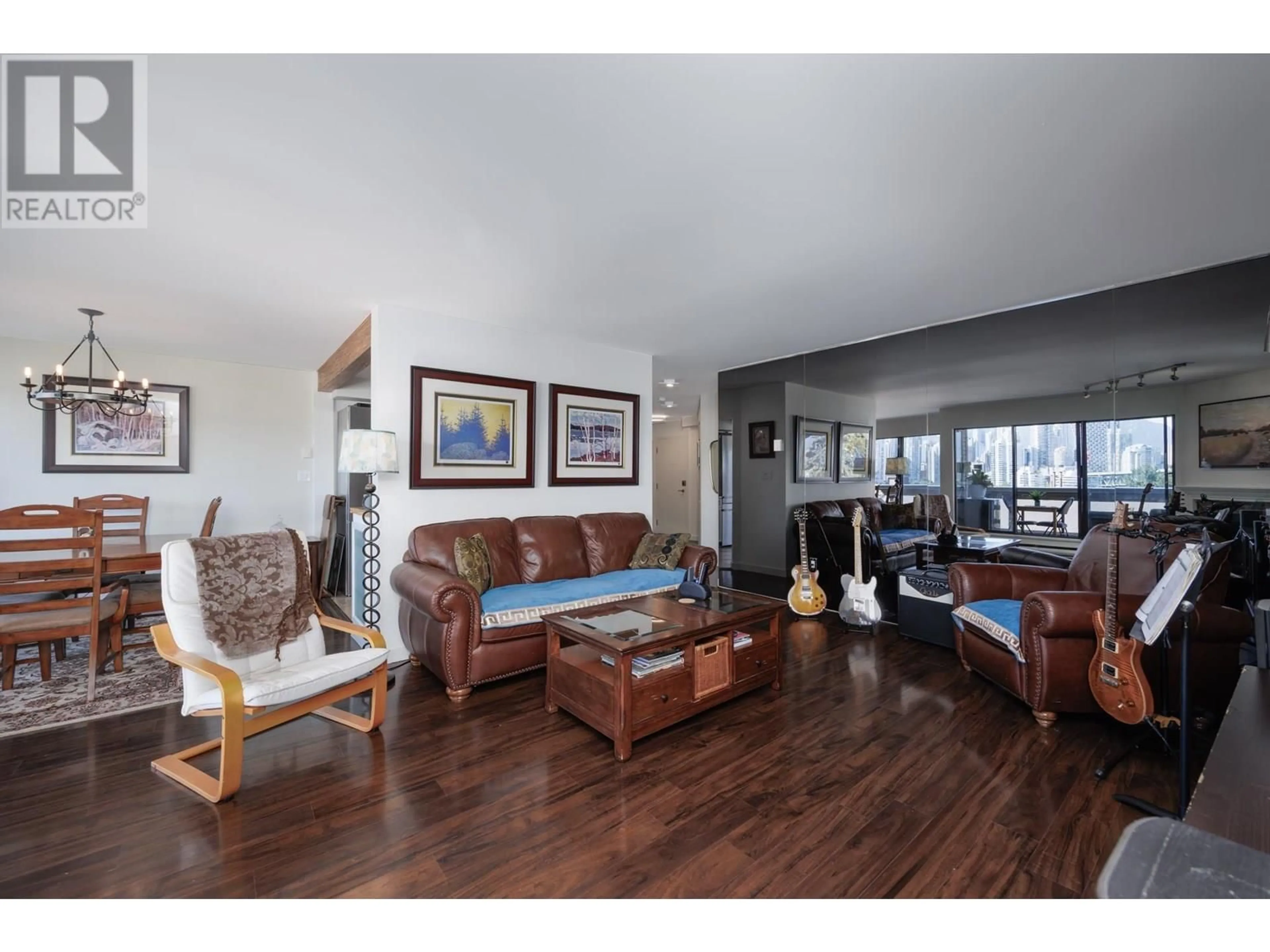Living room with furniture, wood/laminate floor for 203 - 1299 7TH AVENUE, Vancouver British Columbia V6H1B7