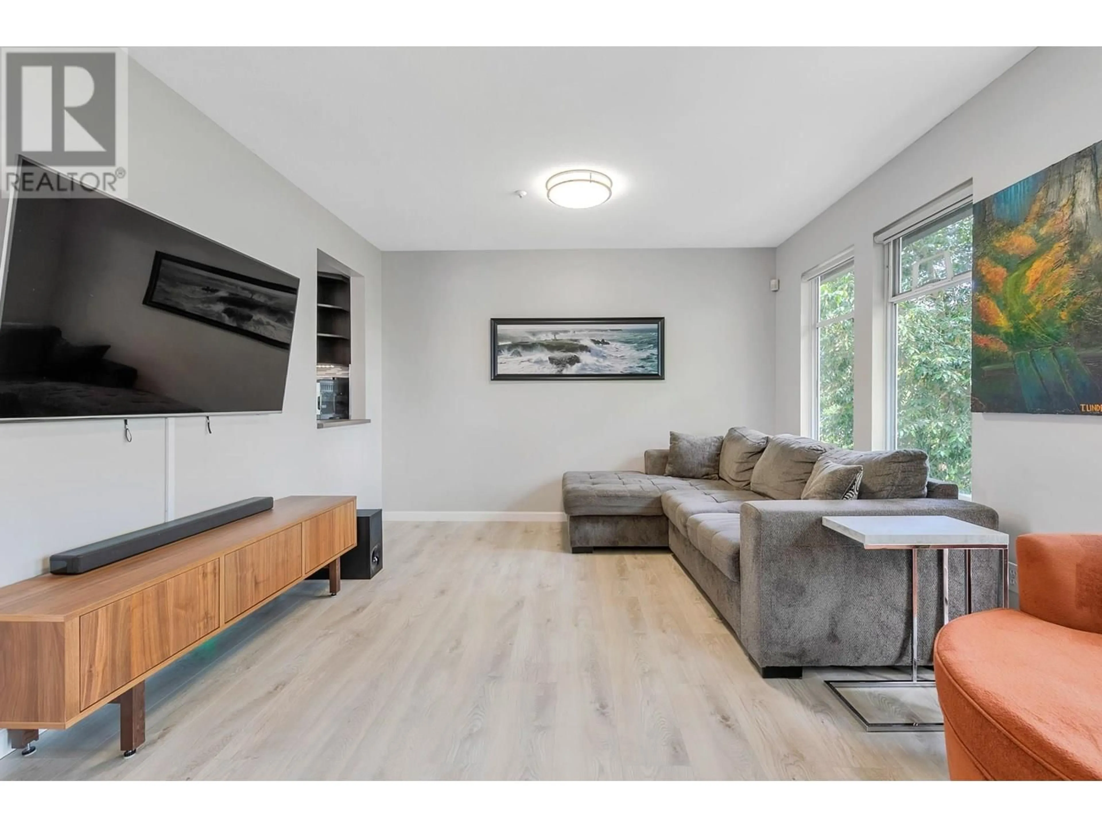 Living room with furniture, wood/laminate floor for 61 - 2450 LOBB AVENUE, Port Coquitlam British Columbia V3C6G8
