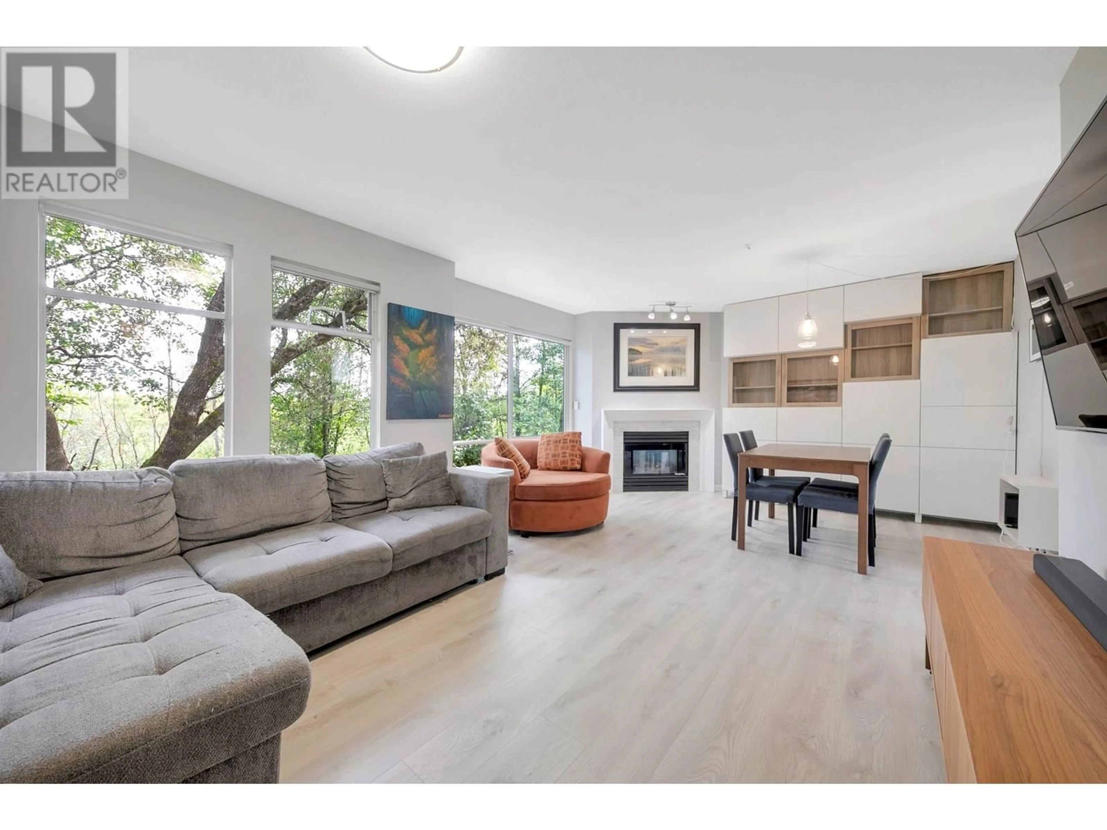Living room with furniture, wood/laminate floor for 61 - 2450 LOBB AVENUE, Port Coquitlam British Columbia V3C6G8