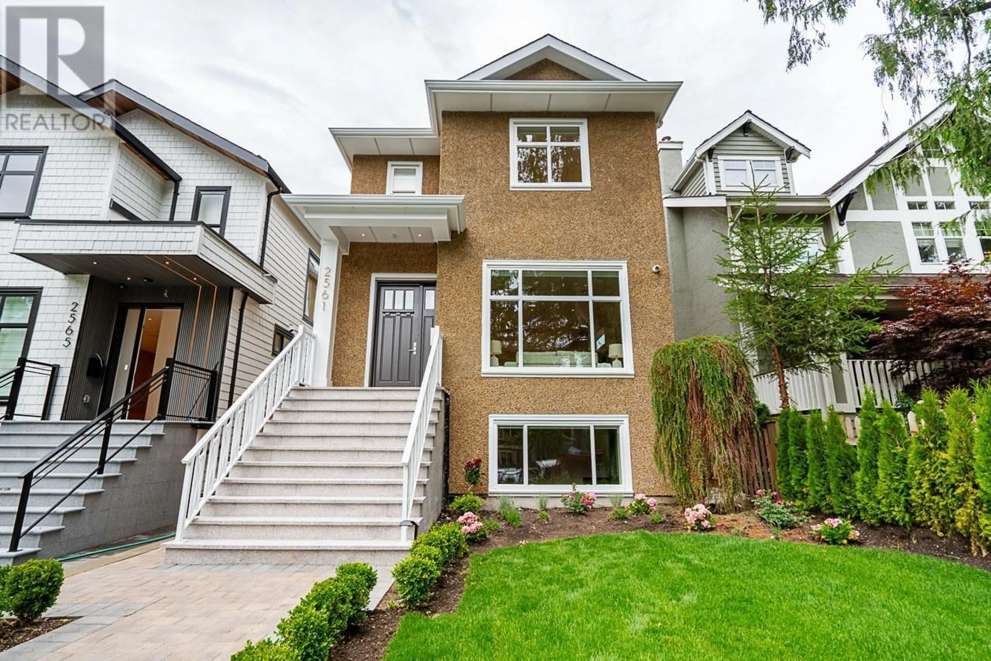Home with brick exterior material, street for 2561 2ND AVENUE, Vancouver British Columbia V6K1J7