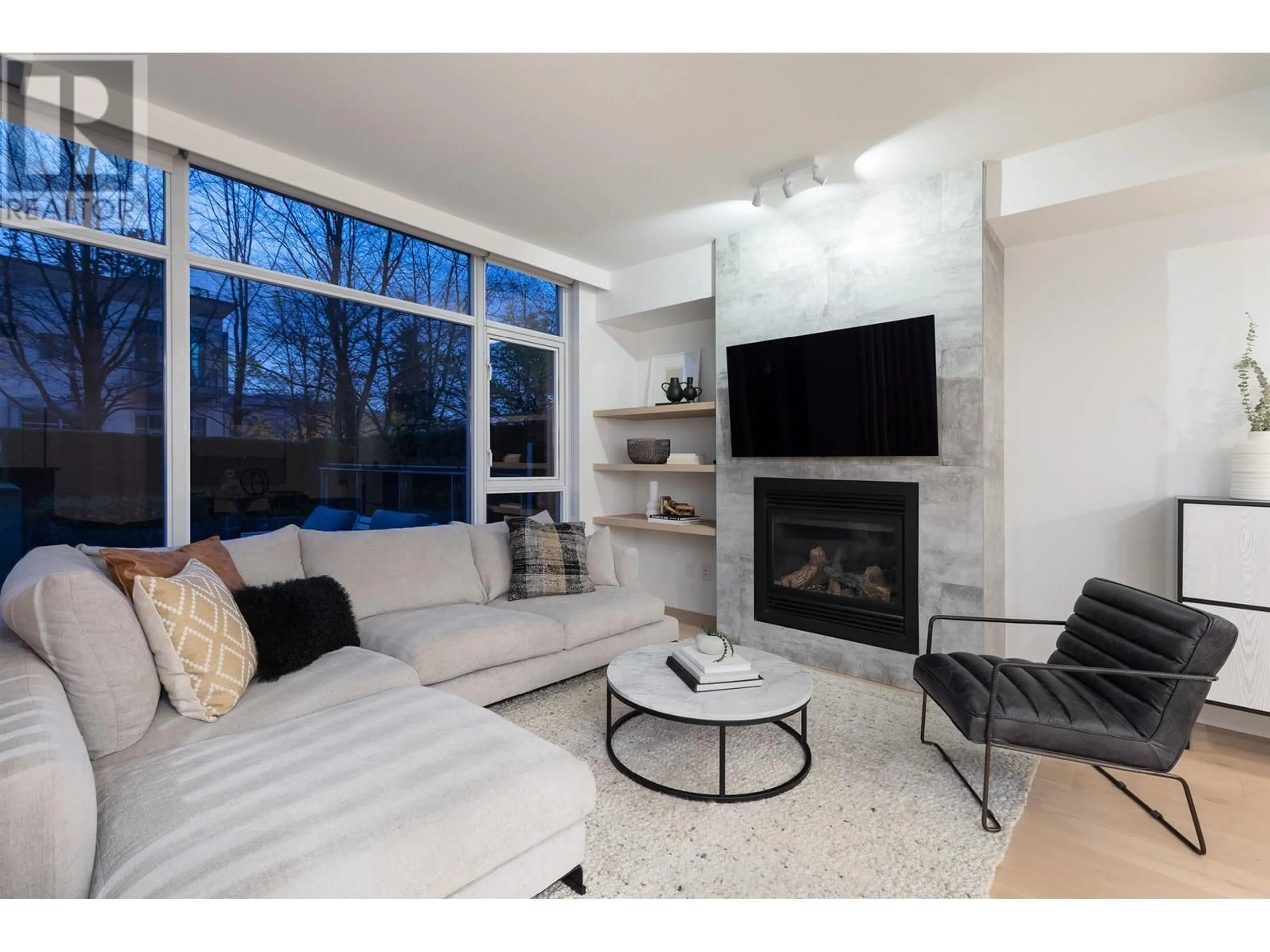 Living room with furniture, wood/laminate floor for TH23 - 1281 CORDOVA STREET, Vancouver British Columbia V6C3R5