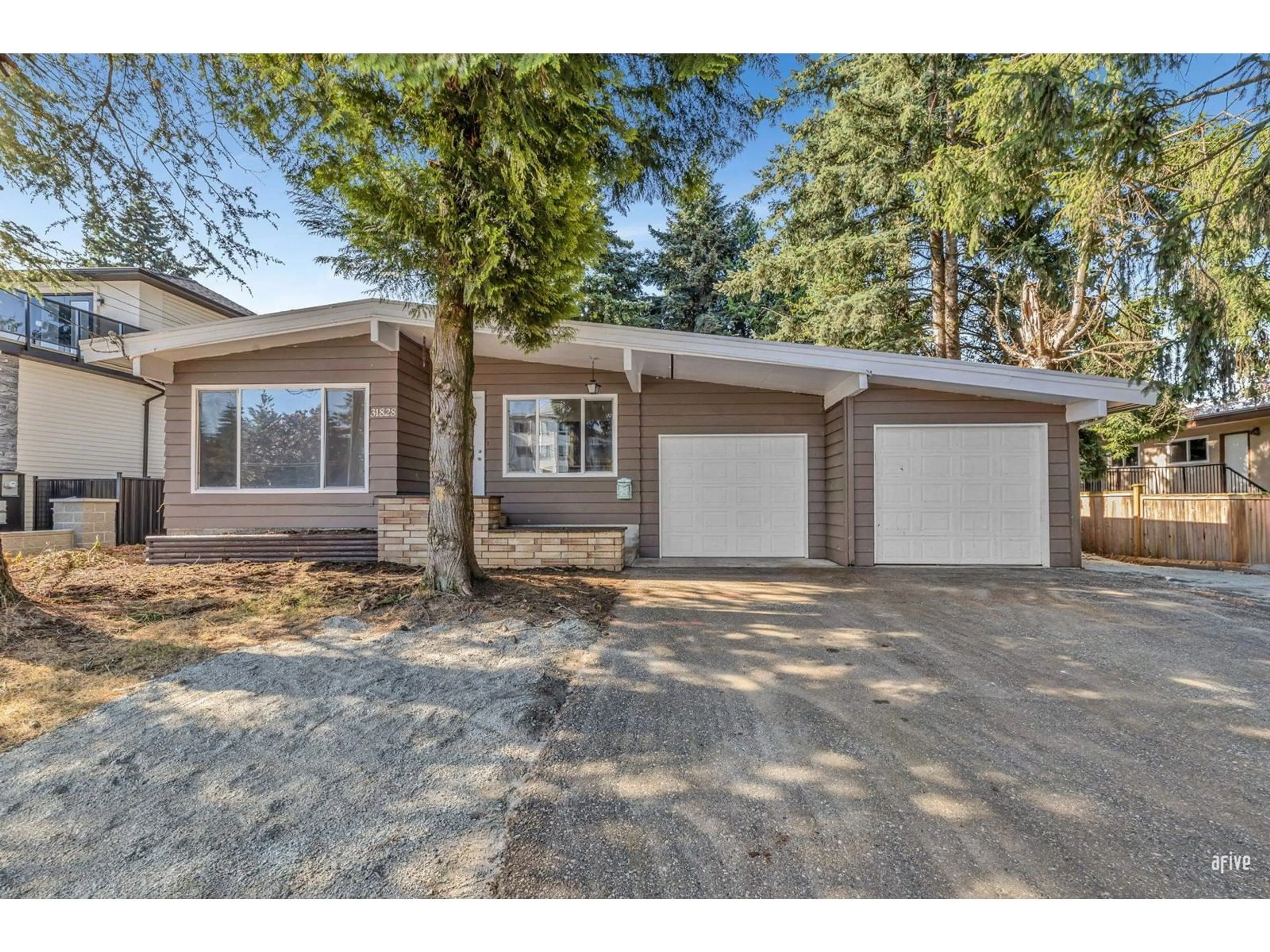 Home with vinyl exterior material, street for 31828 PEARDONVILLE, Abbotsford British Columbia V2T1L6