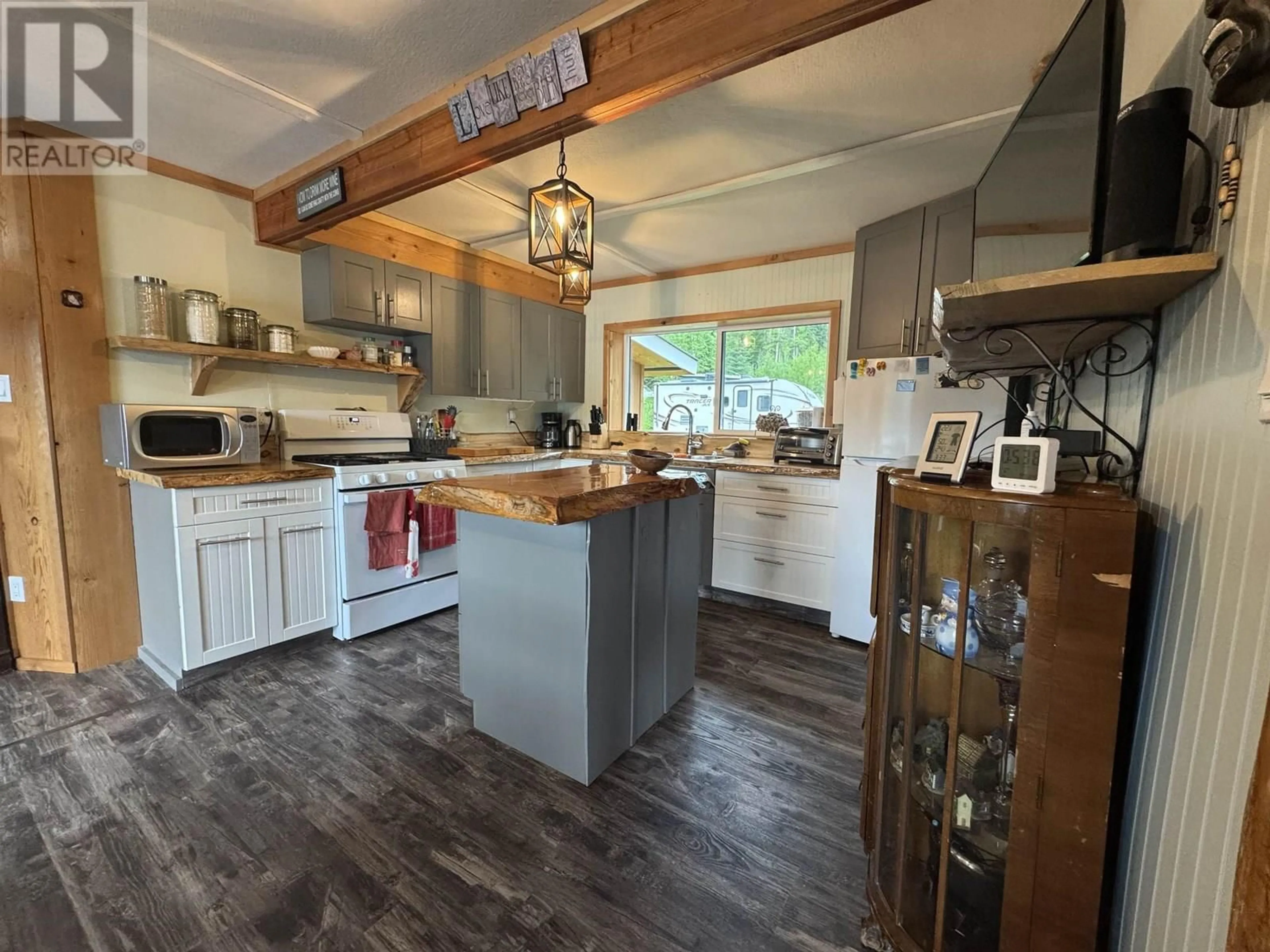 Open concept kitchen, wood/laminate floor for 2261 MCKINLEY FOREST SERVICE ROAD, Horsefly British Columbia V0L1L0