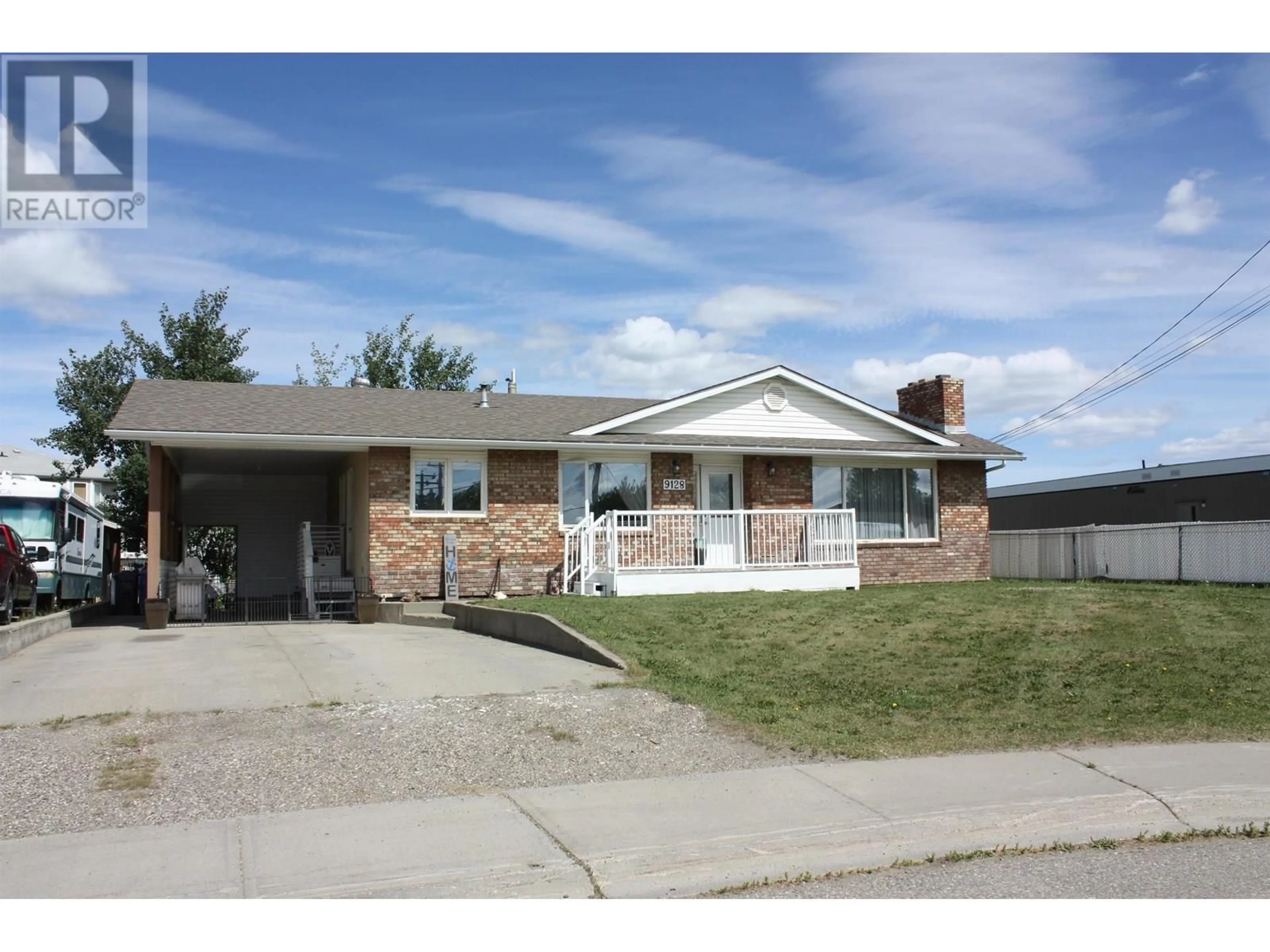 Home with brick exterior material, street for 9128 108 AVENUE, Fort St. John British Columbia V1J4R3