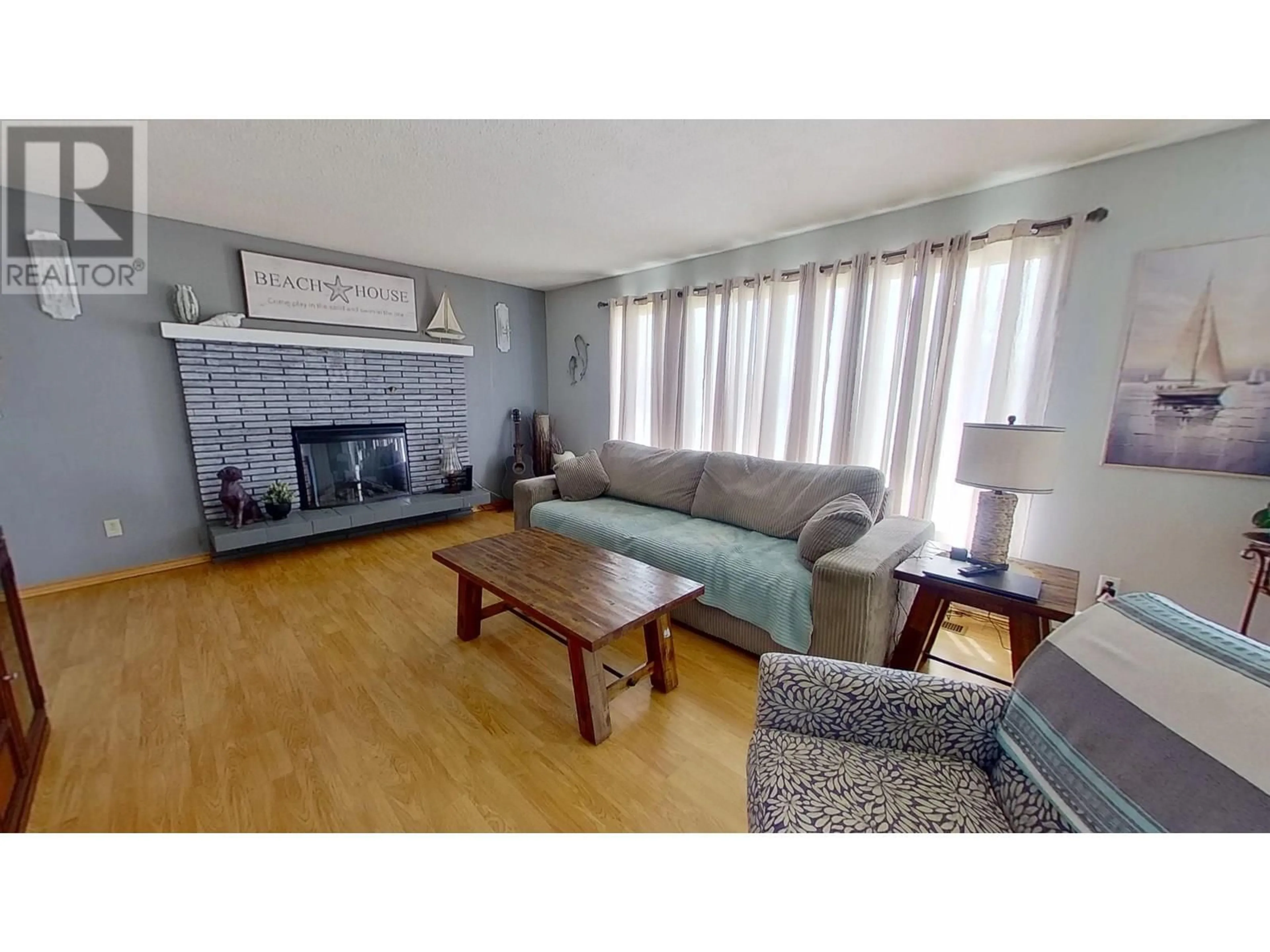 Living room with furniture, unknown for 9128 108 AVENUE, Fort St. John British Columbia V1J4R3