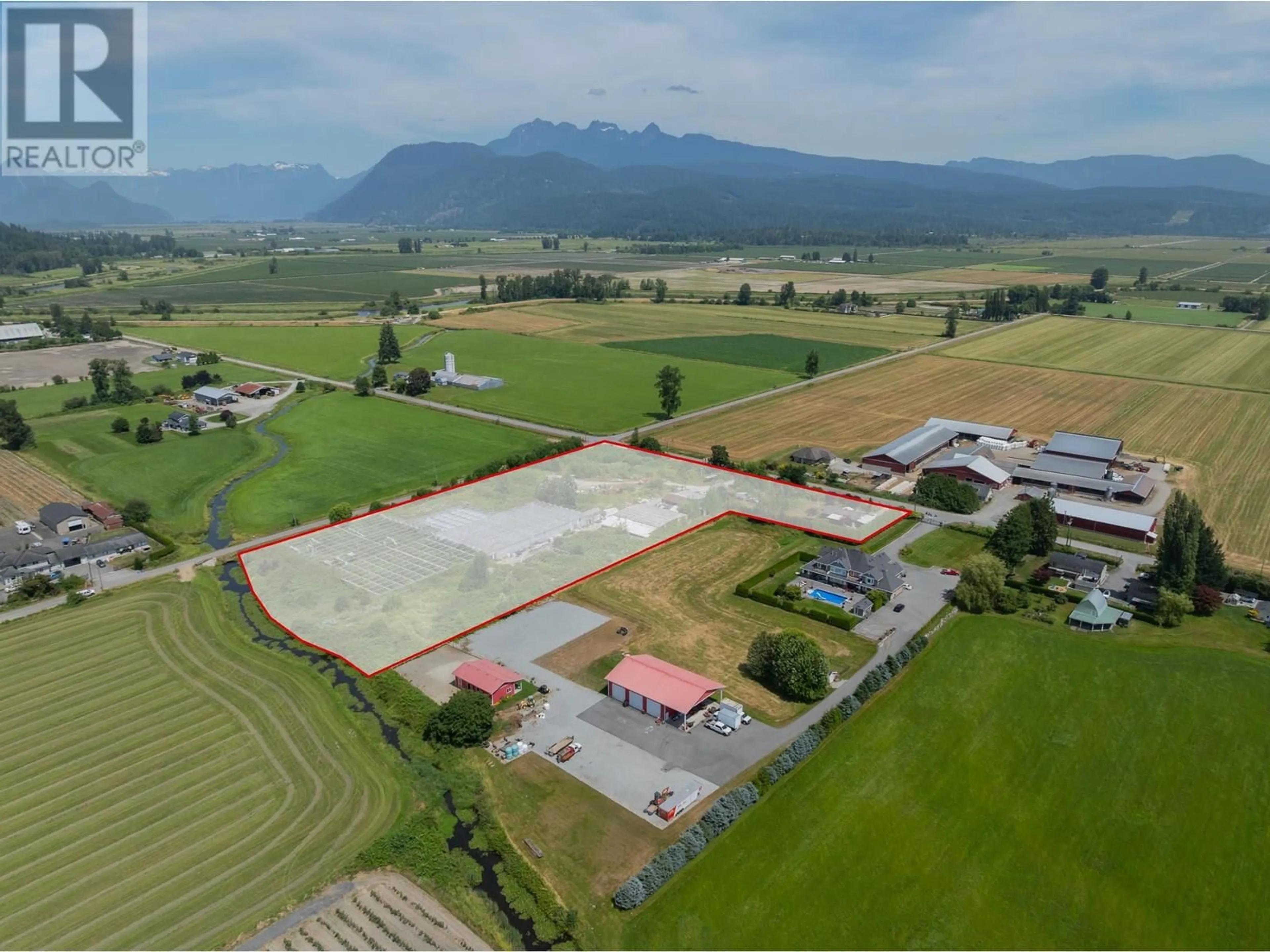 A pic from outside/outdoor area/front of a property/back of a property/a pic from drone, mountain view for 13925 MCKECHNIE ROAD, Pitt Meadows British Columbia V3Y1Z1