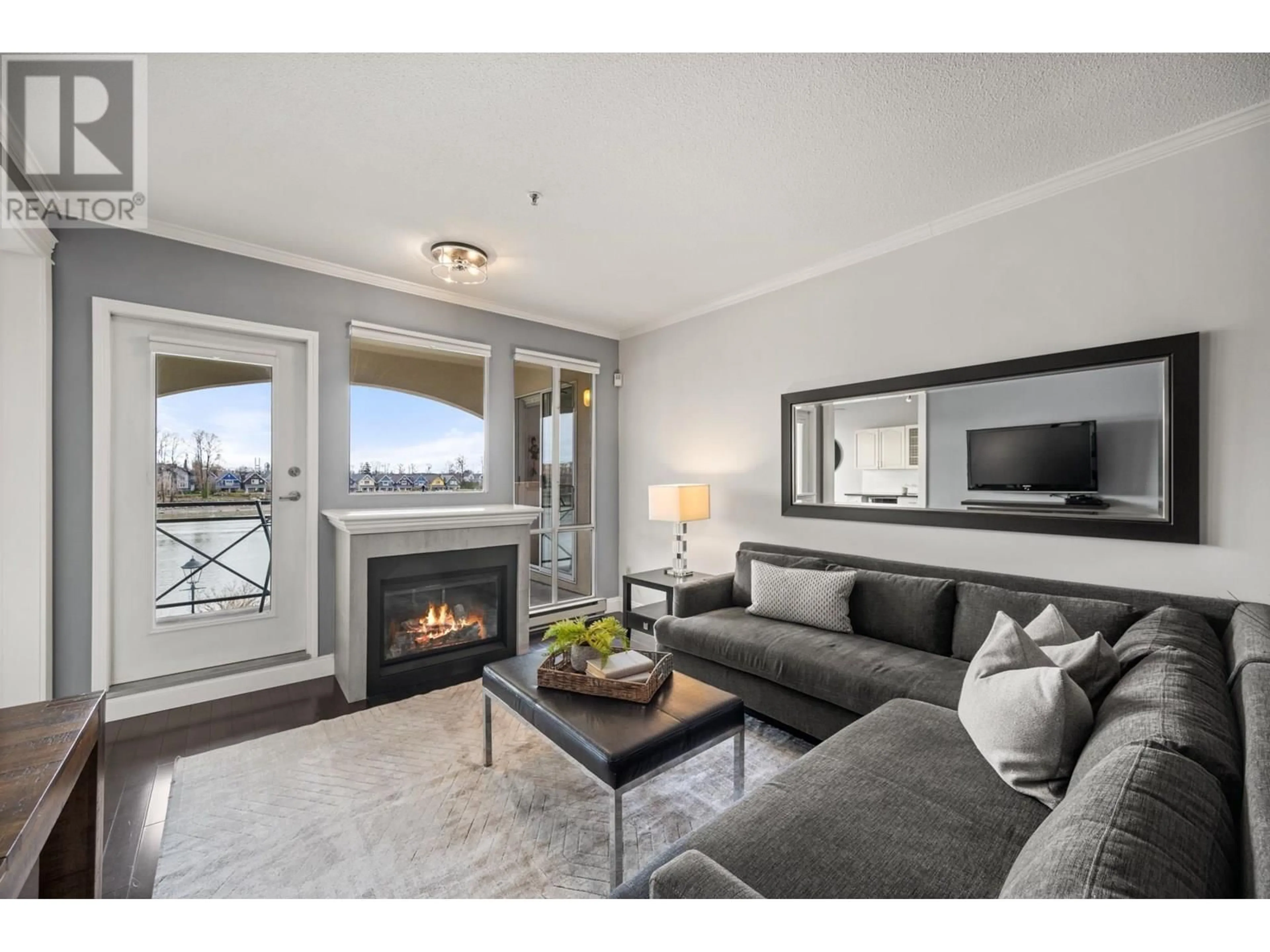 Living room with furniture, unknown for 306 - 2 RENAISSANCE SQUARE, New Westminster British Columbia V3M6K3