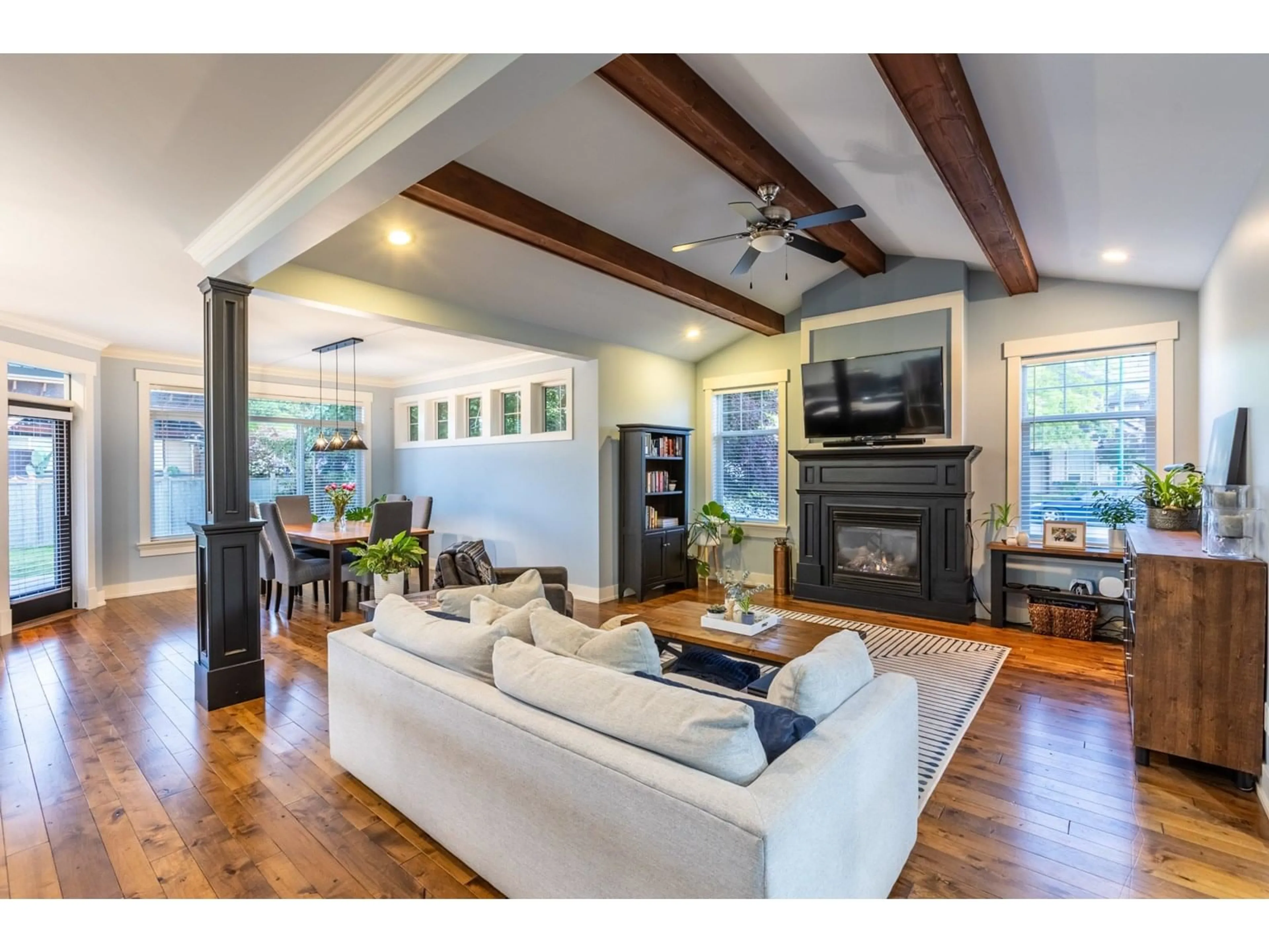 Living room with furniture, wood/laminate floor for 3818 CAVES, Abbotsford British Columbia V3A0A1