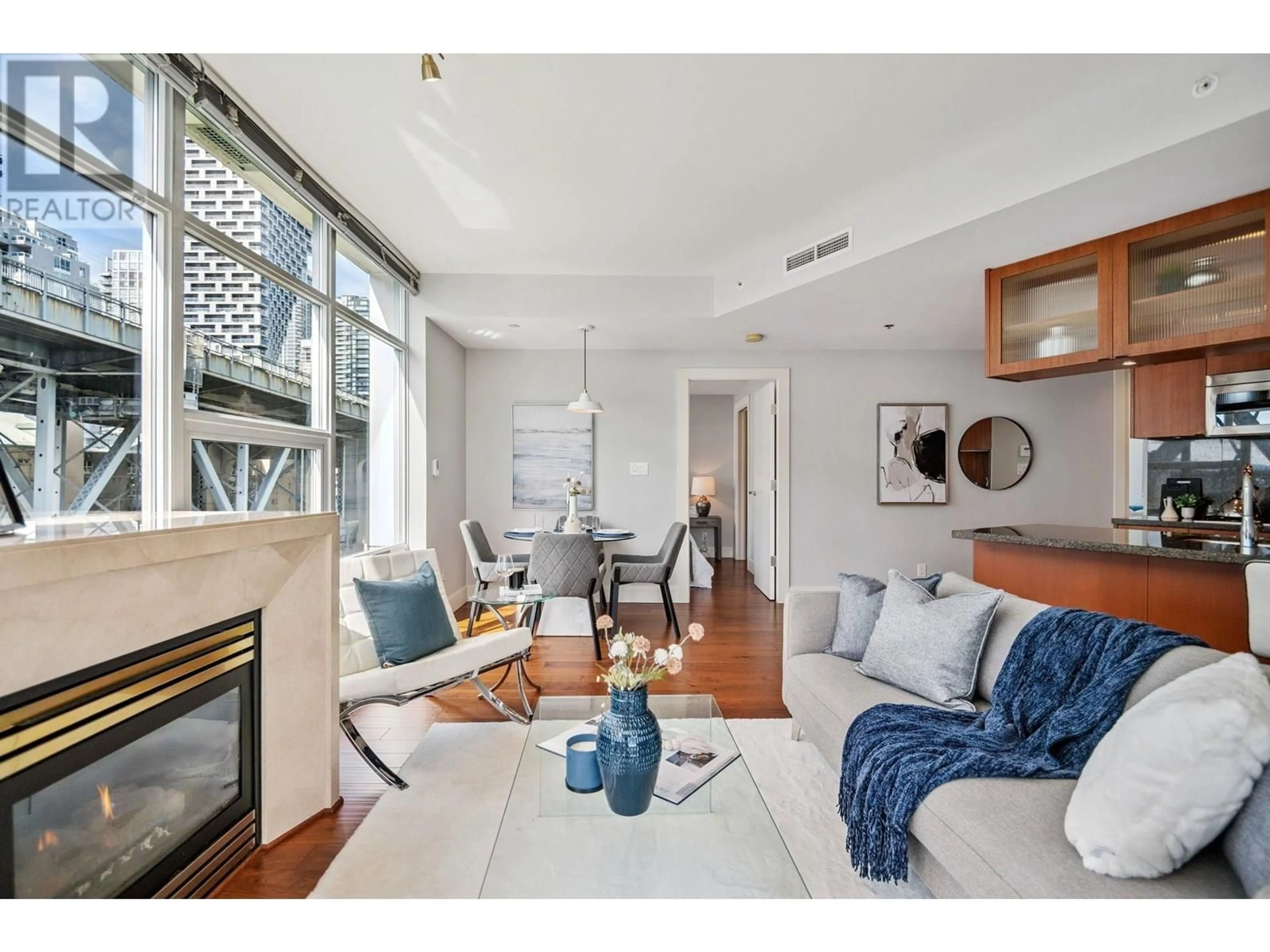 Living room with furniture, unknown for 903 - 628 KINGHORNE MEWS, Vancouver British Columbia V6Z3H6