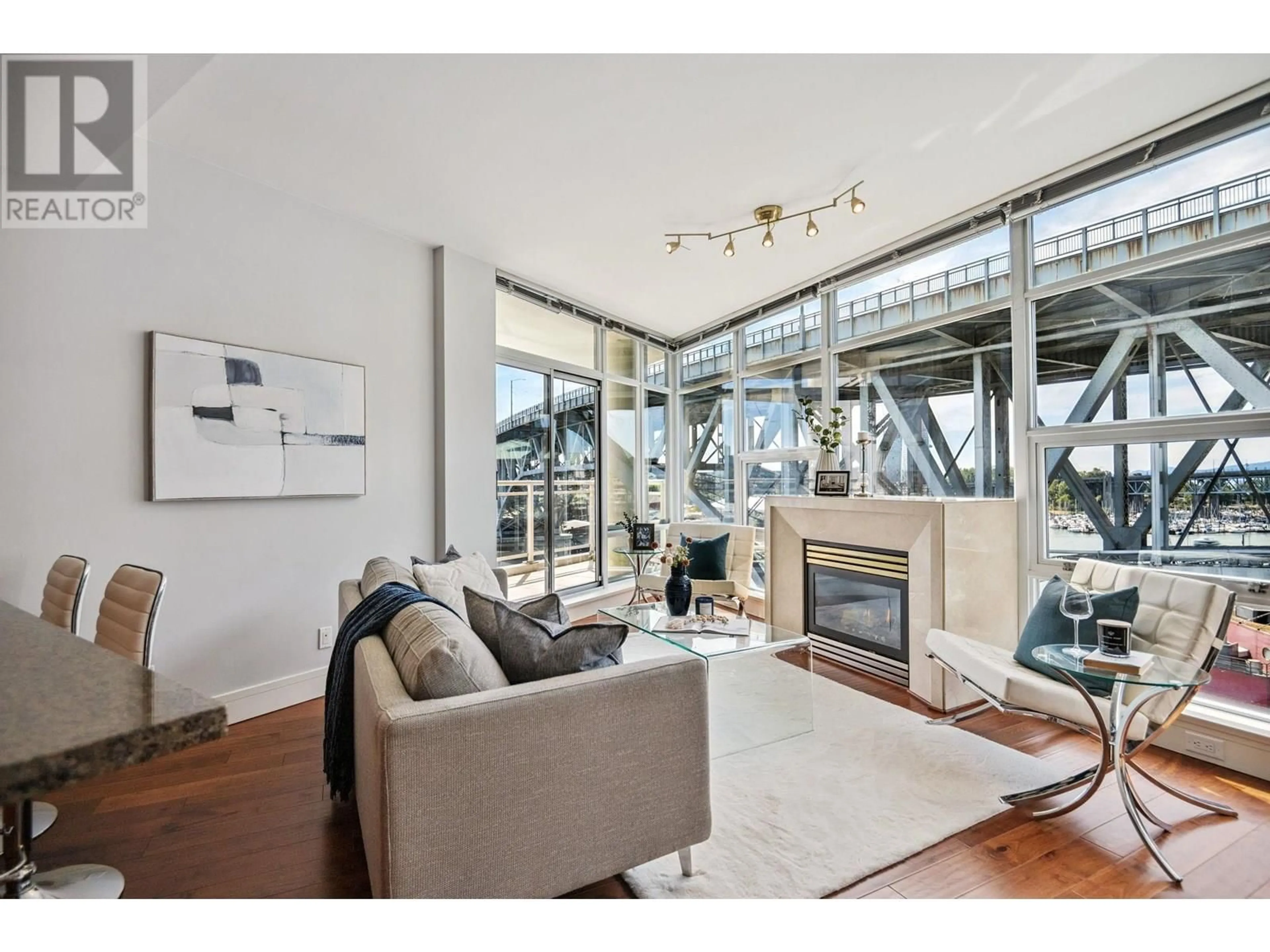 Living room with furniture, unknown for 903 - 628 KINGHORNE MEWS, Vancouver British Columbia V6Z3H6