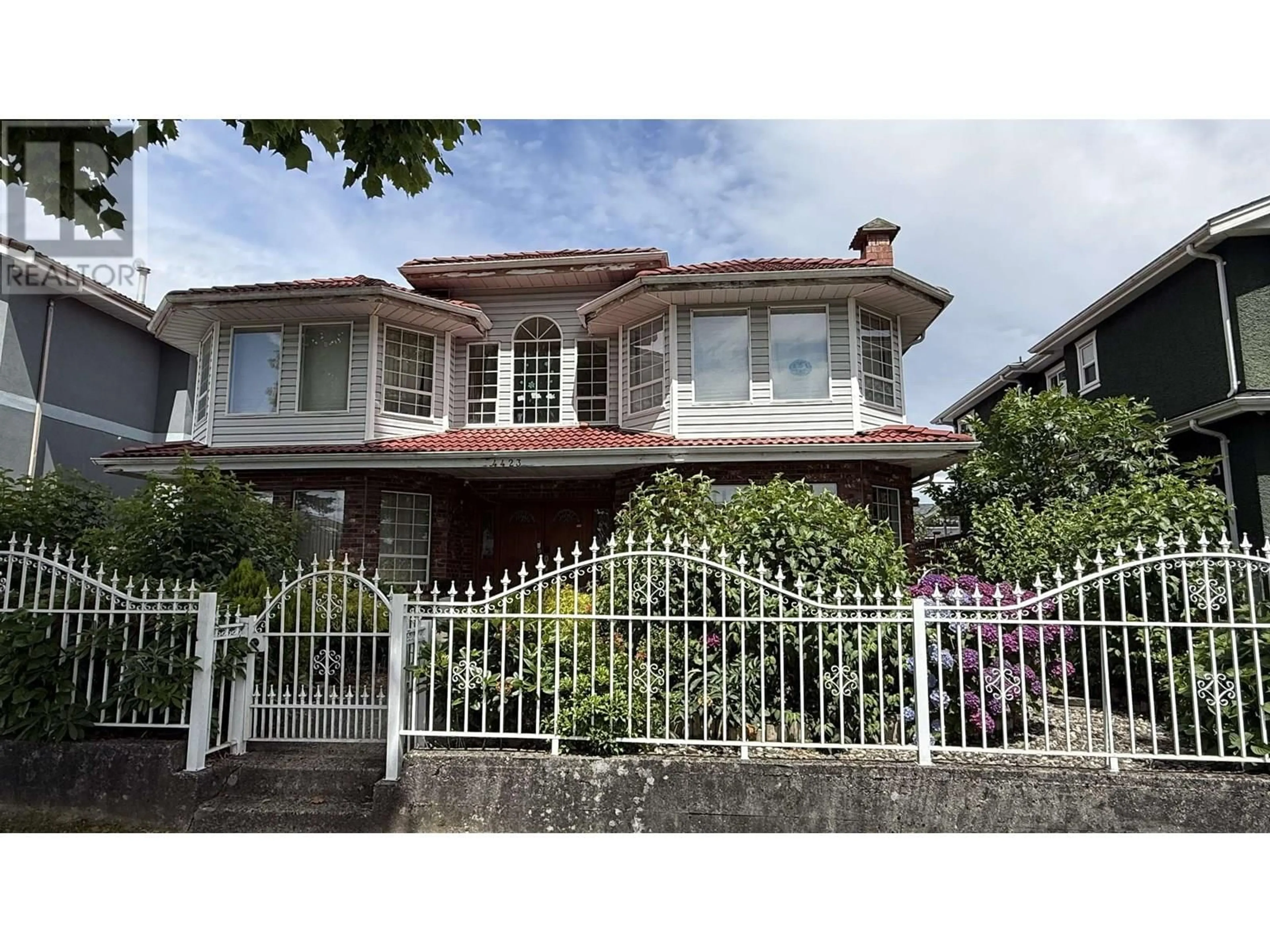 Home with brick exterior material, street for 4423 WILLIAM STREET, Burnaby British Columbia V5C3K2