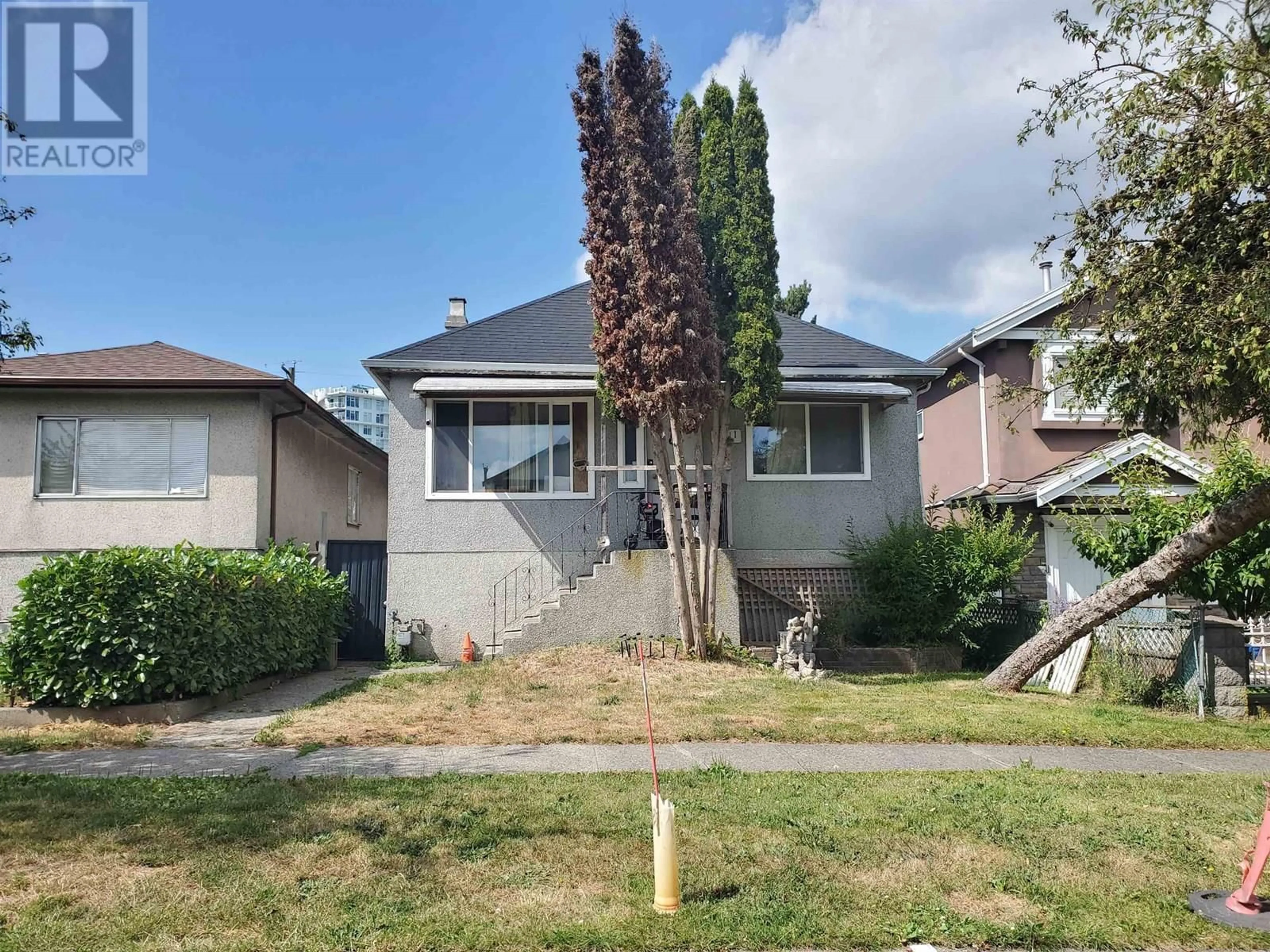 Home with vinyl exterior material, street for 2211 MANNERING AVENUE, Vancouver British Columbia V5N3C5