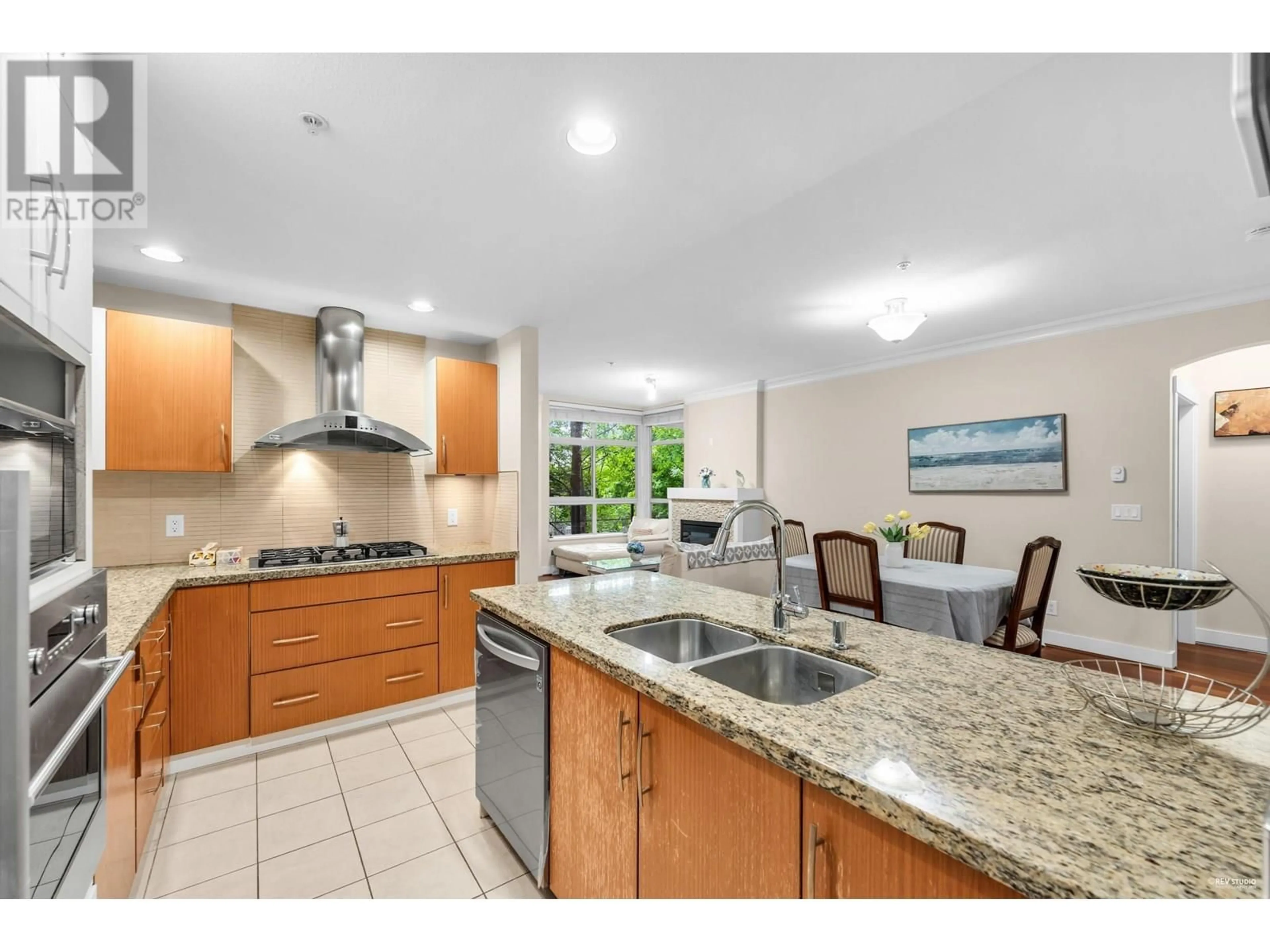 Open concept kitchen, ceramic/tile floor for 212 - 6333 LARKIN DRIVE, Vancouver British Columbia V6T0A7