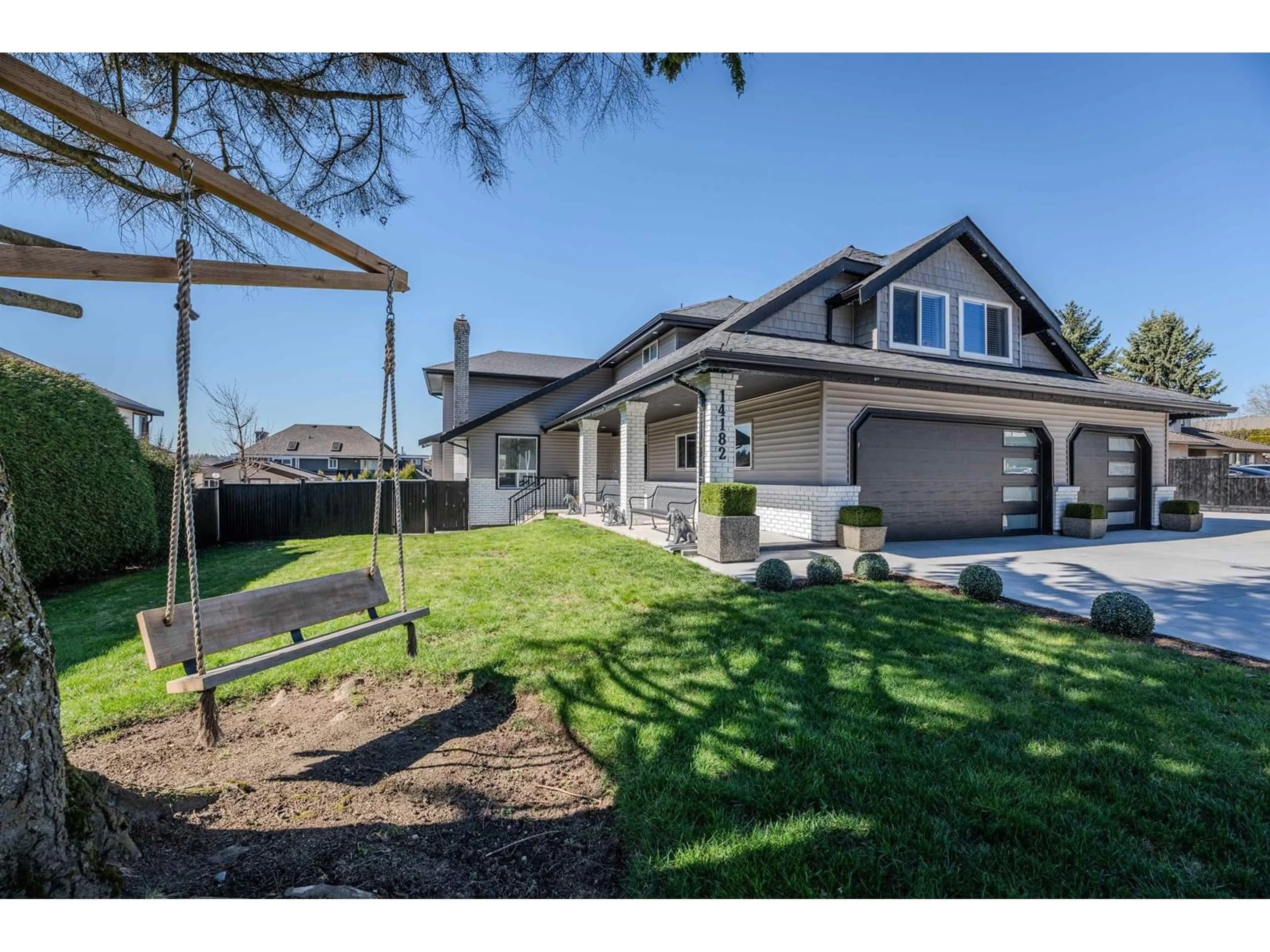Home with vinyl exterior material, street for 14182 83, Surrey British Columbia V3W0V7