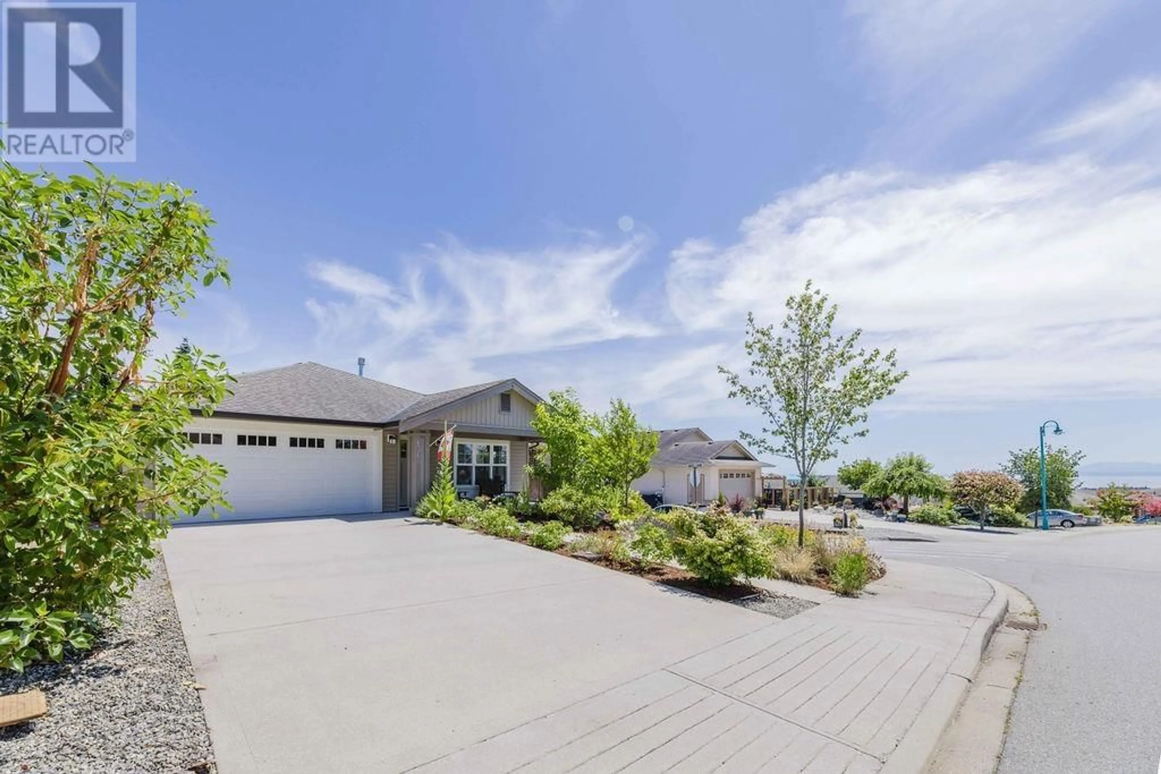 A pic from outside/outdoor area/front of a property/back of a property/a pic from drone, water/lake/river/ocean view for 6360 BAILLIE ROAD, Sechelt British Columbia V7Z0V2