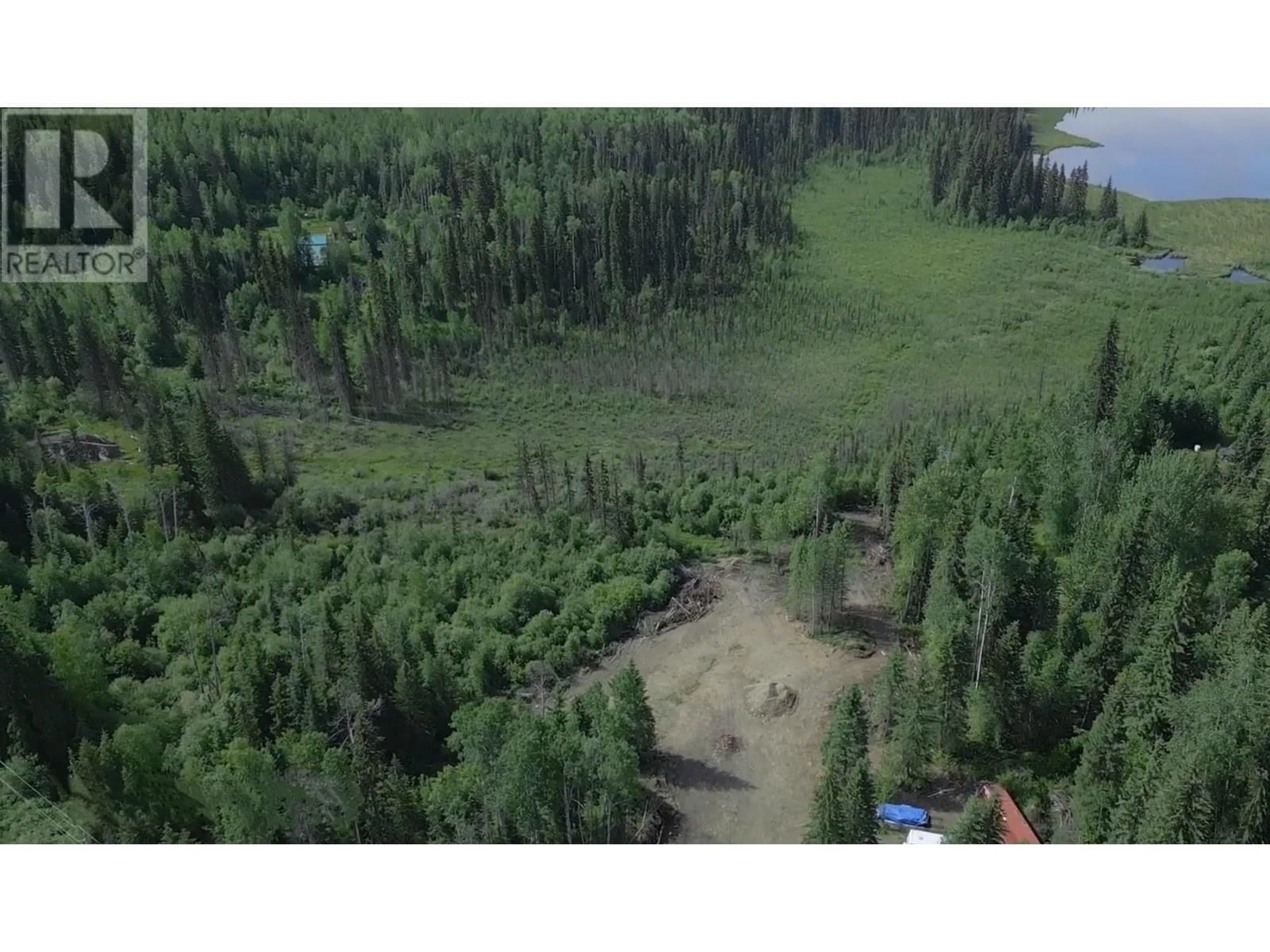 A pic from outside/outdoor area/front of a property/back of a property/a pic from drone, forest/trees view for 6304 MILLAR ROAD, Horsefly British Columbia V0L1L0