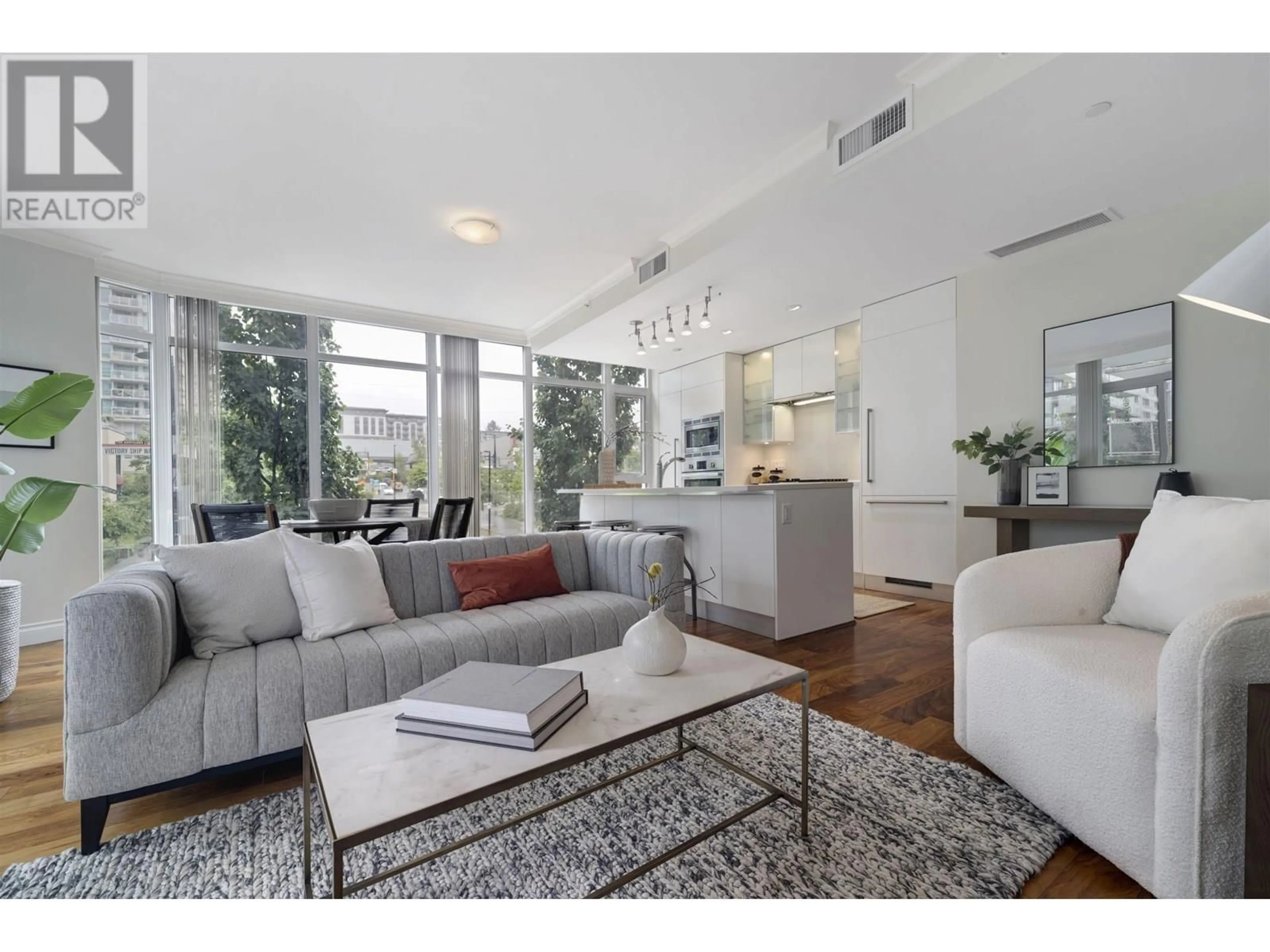 Living room with furniture, unknown for 209 - 199 VICTORY SHIP WAY, North Vancouver British Columbia V9L0E2