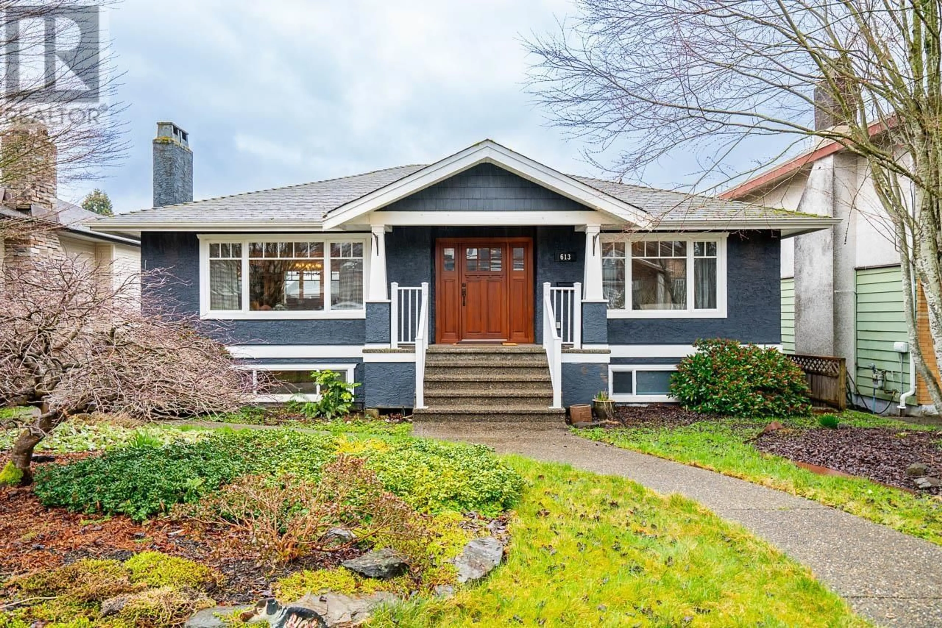 Home with vinyl exterior material, street for 613 7TH STREET, North Vancouver British Columbia V7L1S5