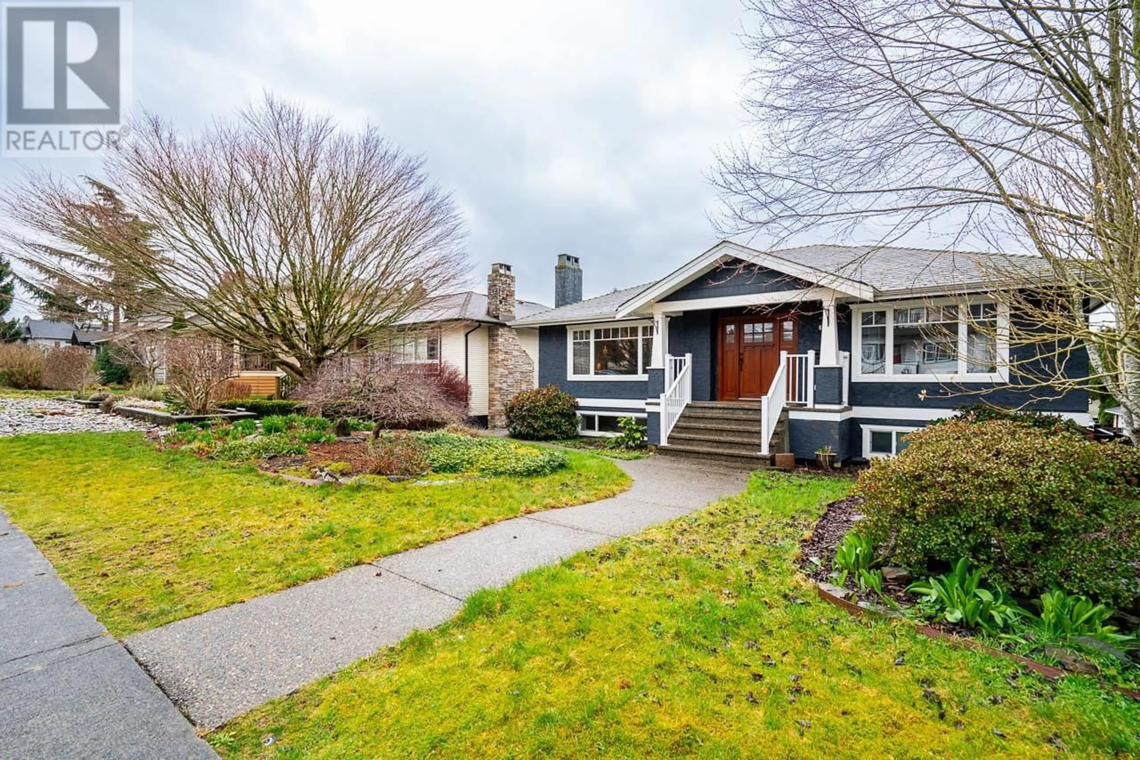Home with vinyl exterior material, street for 613 7TH STREET, North Vancouver British Columbia V7L1S5