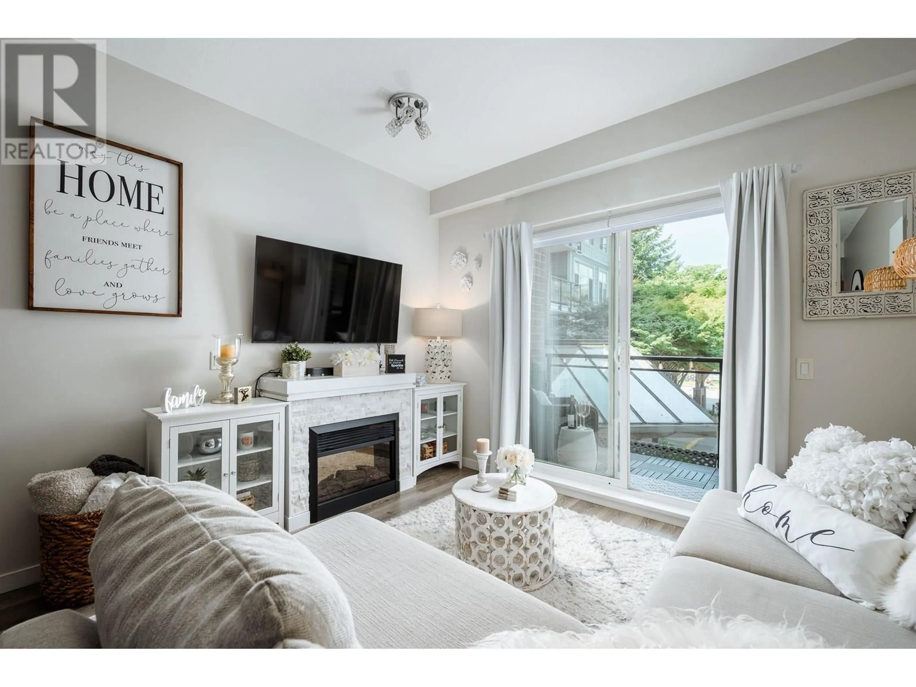 Living room with furniture, unknown for 215 - 11950 HARRIS ROAD, Pitt Meadows British Columbia V3Y0B7