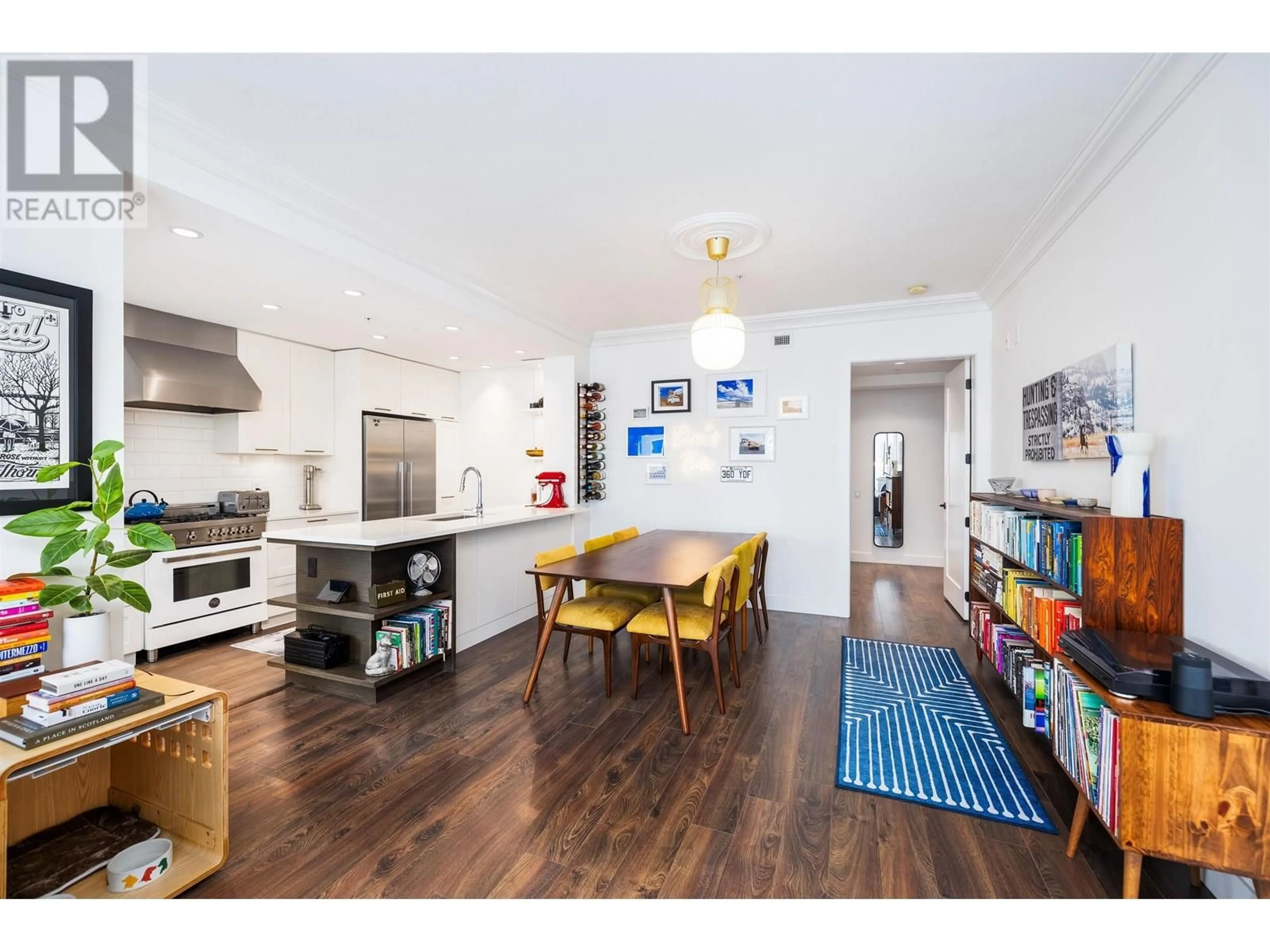 Open concept kitchen, wood/laminate floor for 302 - 168 35TH AVENUE, Vancouver British Columbia V5W1A6