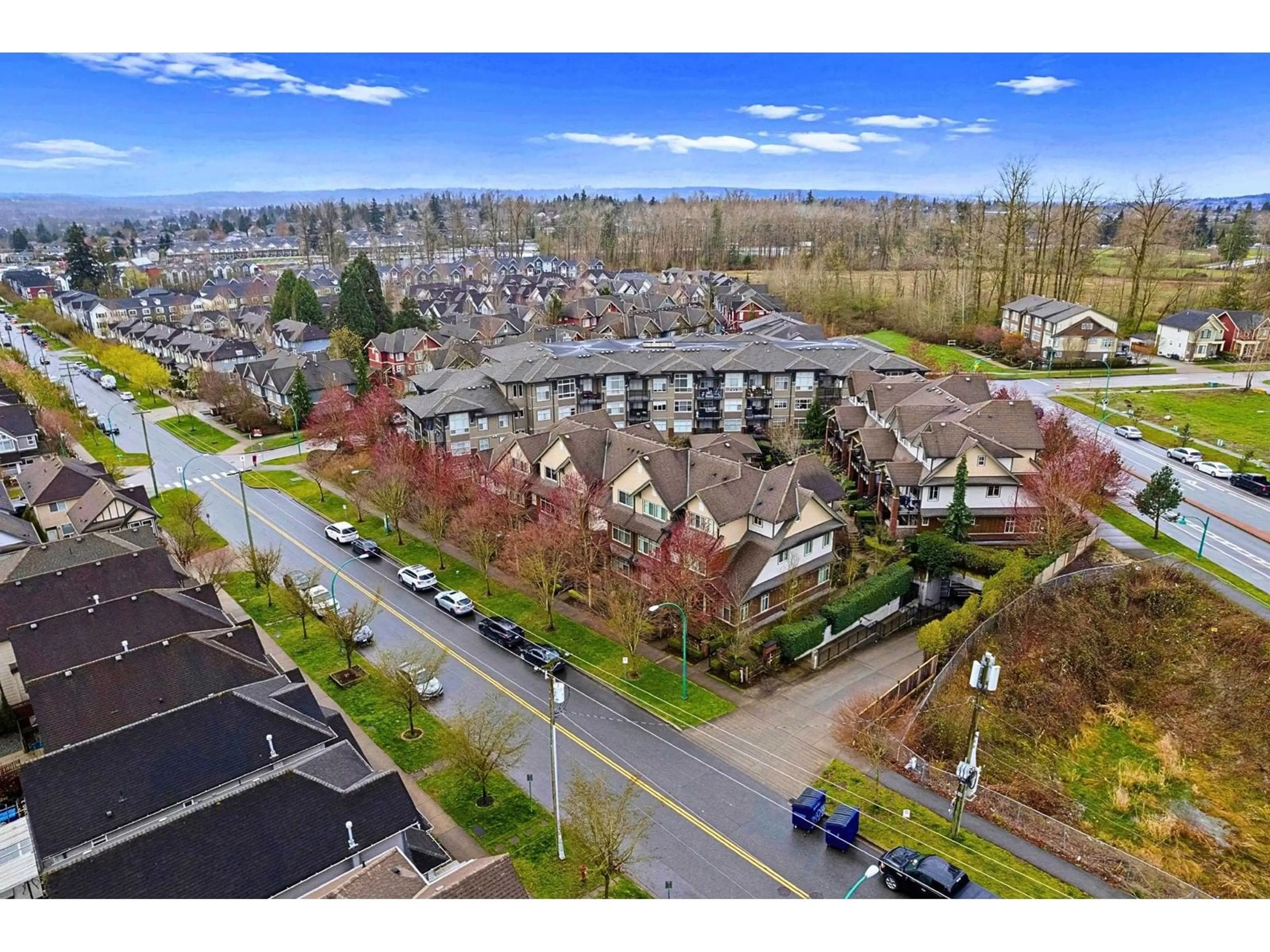 A pic from outside/outdoor area/front of a property/back of a property/a pic from drone, mountain view for 208 - 6655 192, Surrey British Columbia V4N0B9