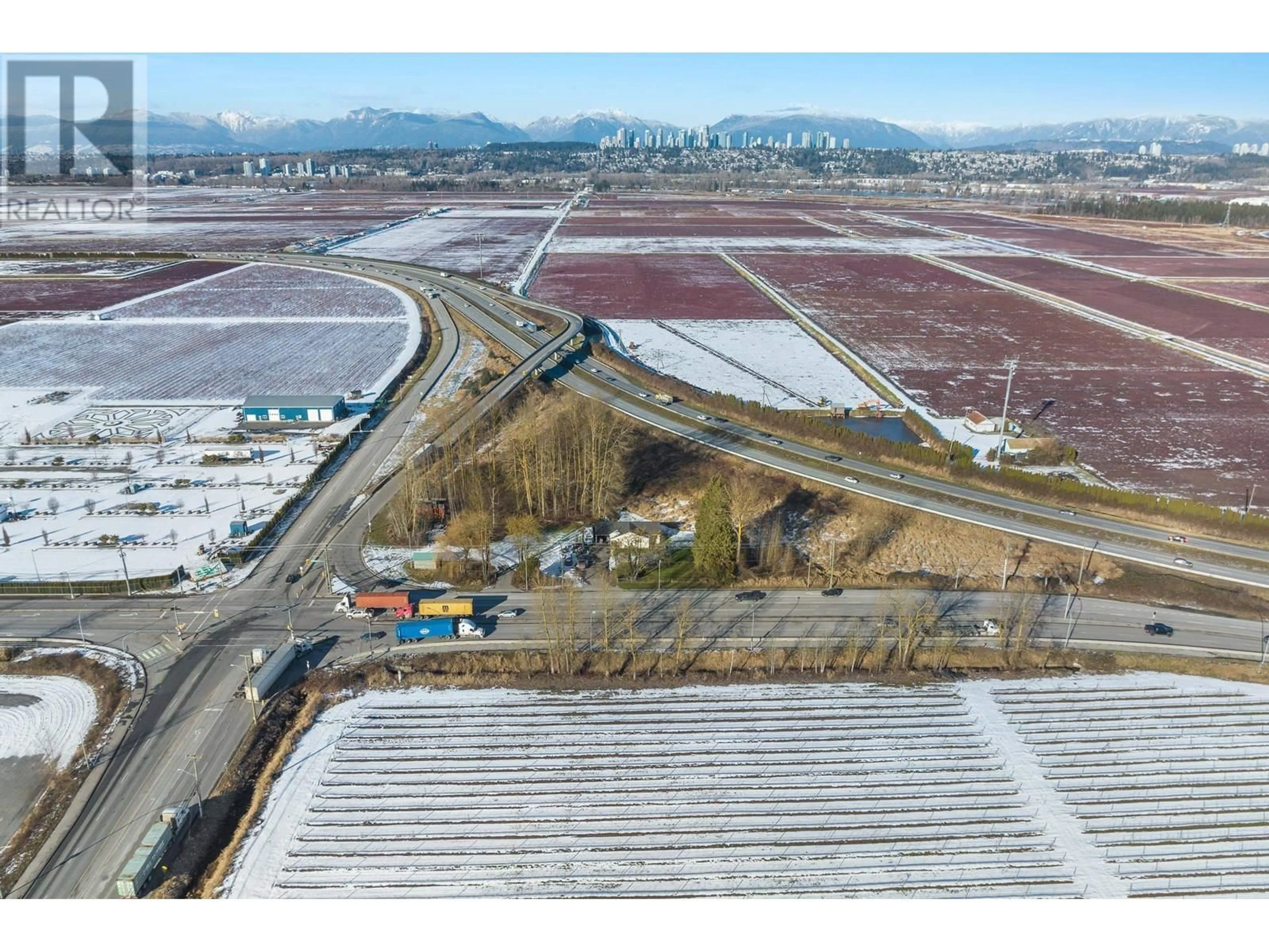 A pic from outside/outdoor area/front of a property/back of a property/a pic from drone, mountain view for 19051 WESTMINSTER HIGHWAY, Richmond British Columbia V6V1B2