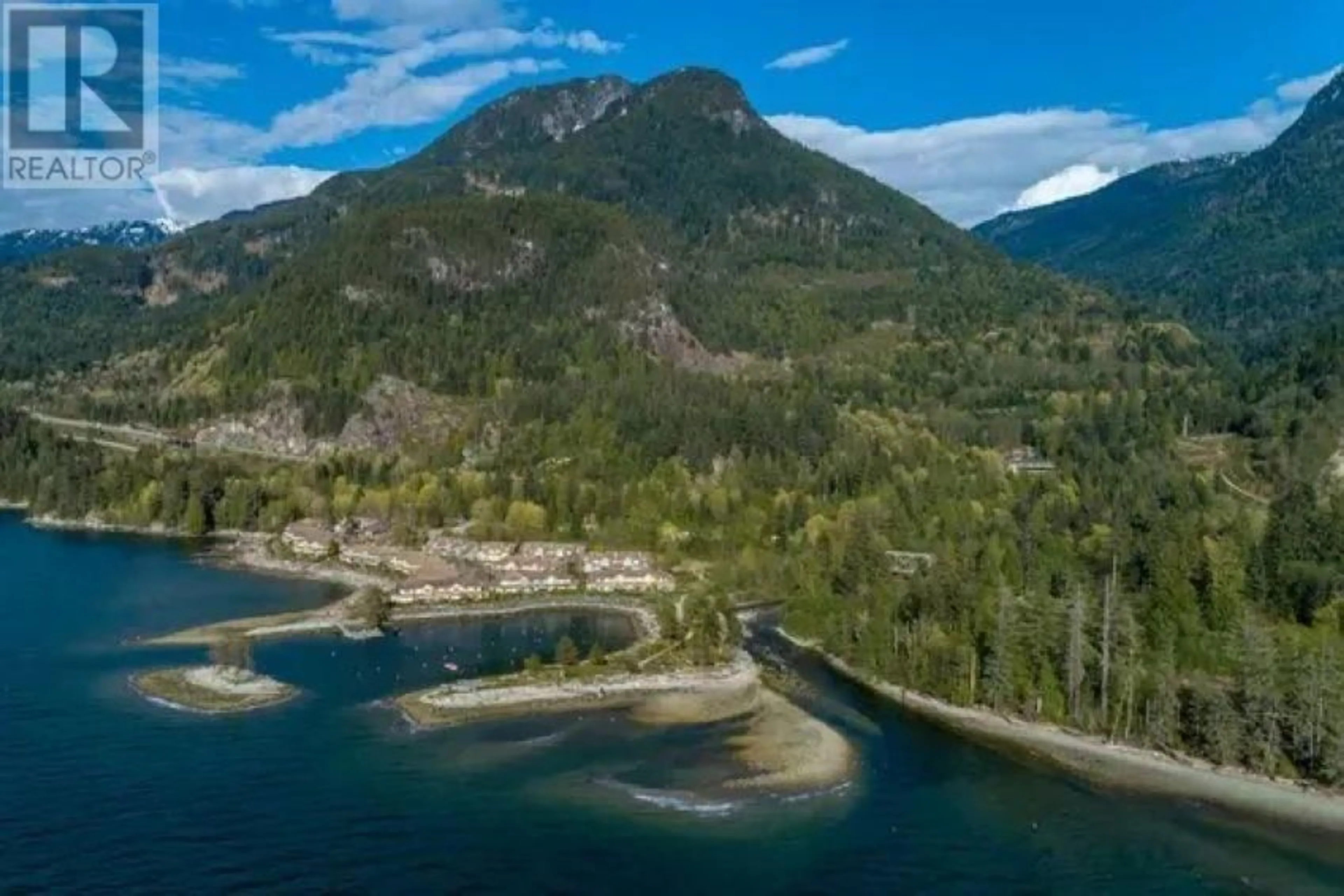 A pic from outside/outdoor area/front of a property/back of a property/a pic from drone, water/lake/river/ocean view for 15 BEACH DRIVE, West Vancouver British Columbia V8B1A2
